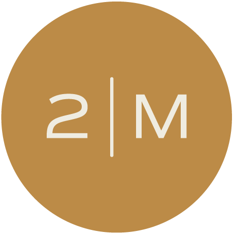 Gold circular icon with '2 | M' in white text.