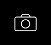 Icon of a camera on a black background
