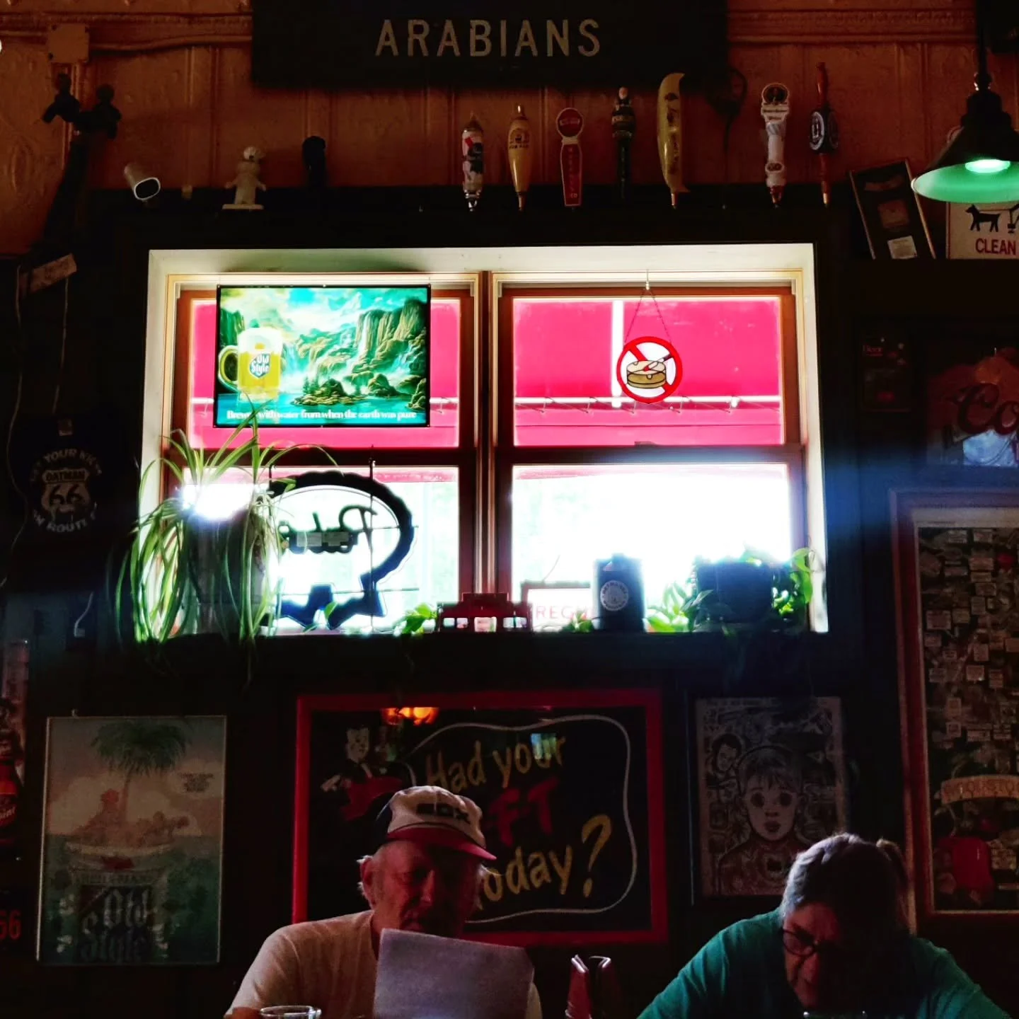 Every unintentional Renaissance painting deserves stained glass. A Friday afternoon spent belly'd up, devotees study the scripture of independent local news and crosswords, while the hymnals of Bob Seger's Night Moves reminds us "we were just yo