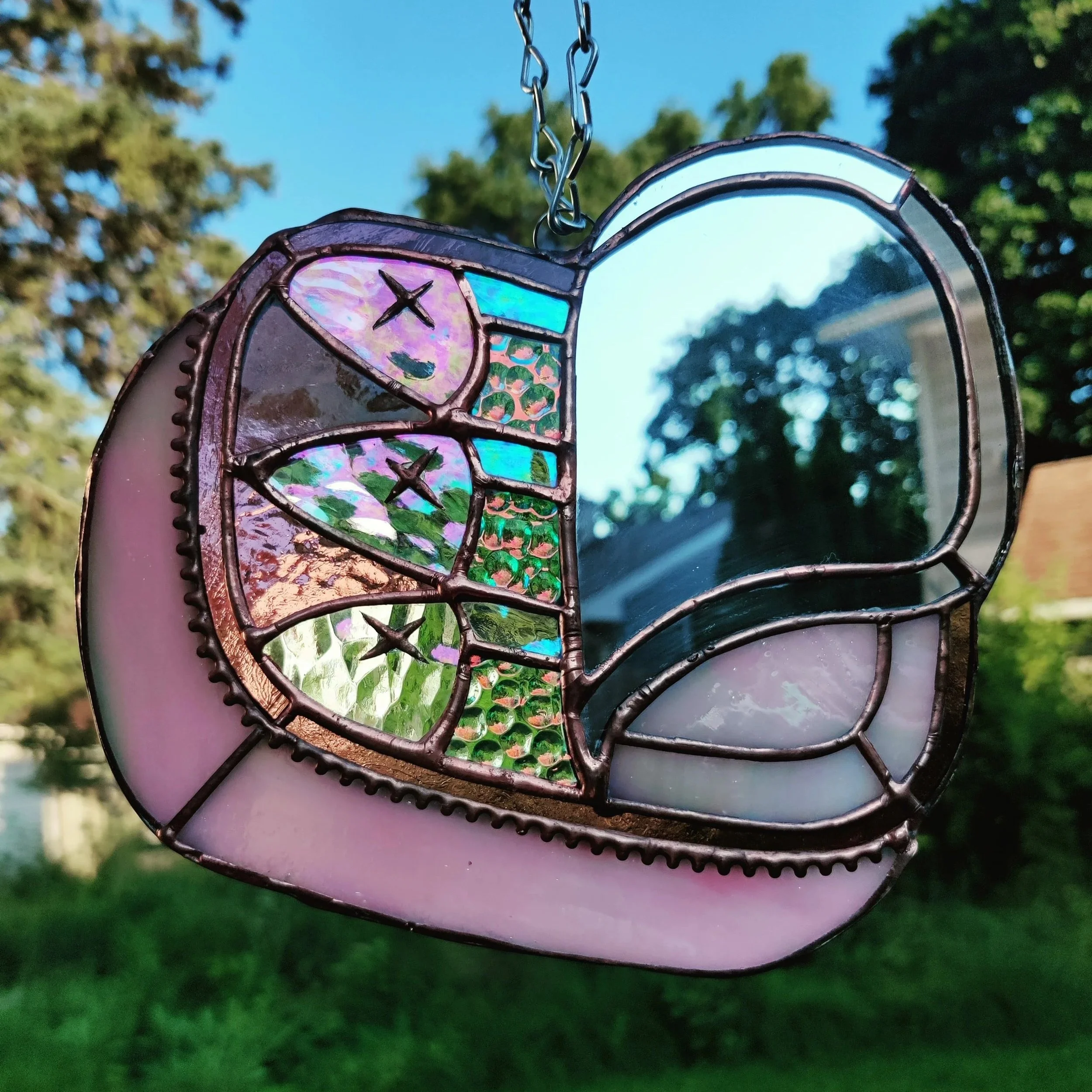 pink and copper stained glass with mirror and iridescent glass