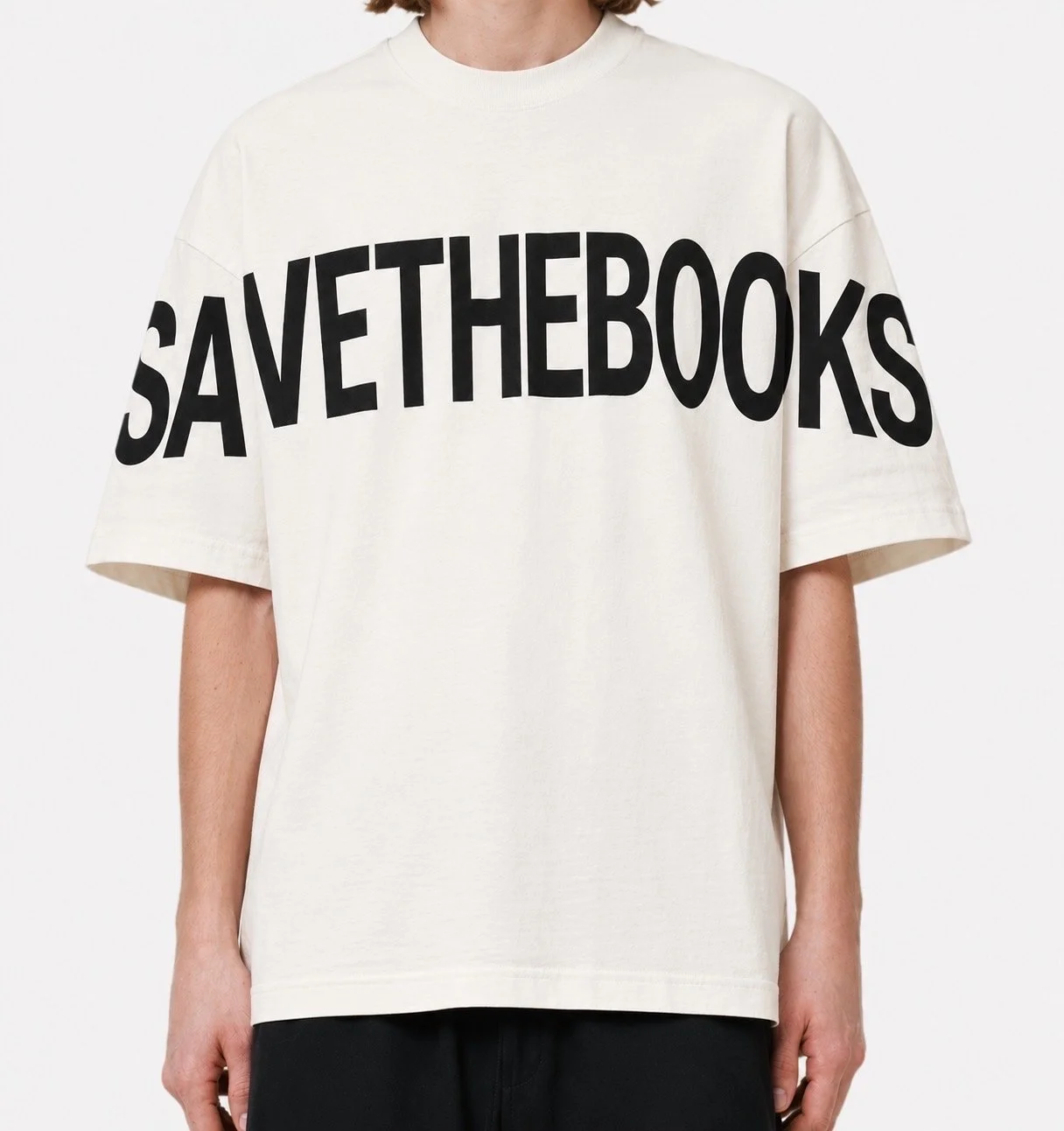 A T-shirt with large black text 'SAVE THE BOOKS' across the chest.