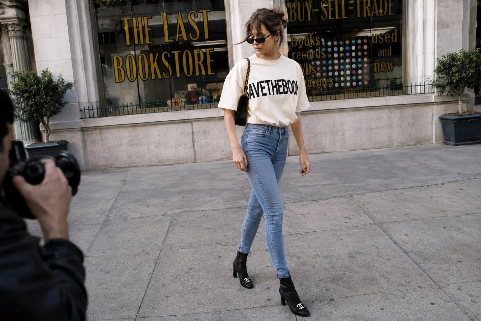 Save The Books t-shirt in front of The Last Bookstore to promote book rescue and literacy.