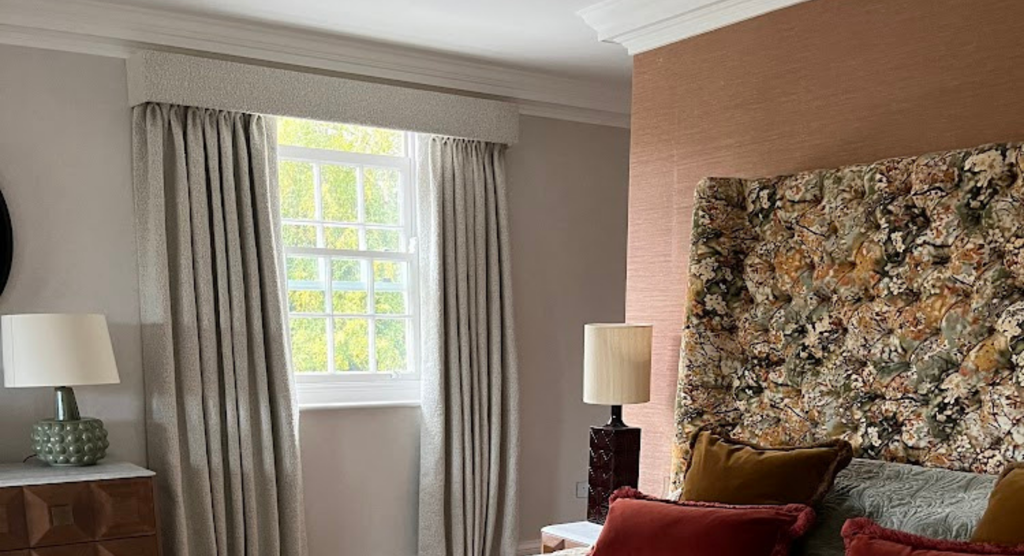 Boucle curtains and pelmet and large deep buttoned headboard