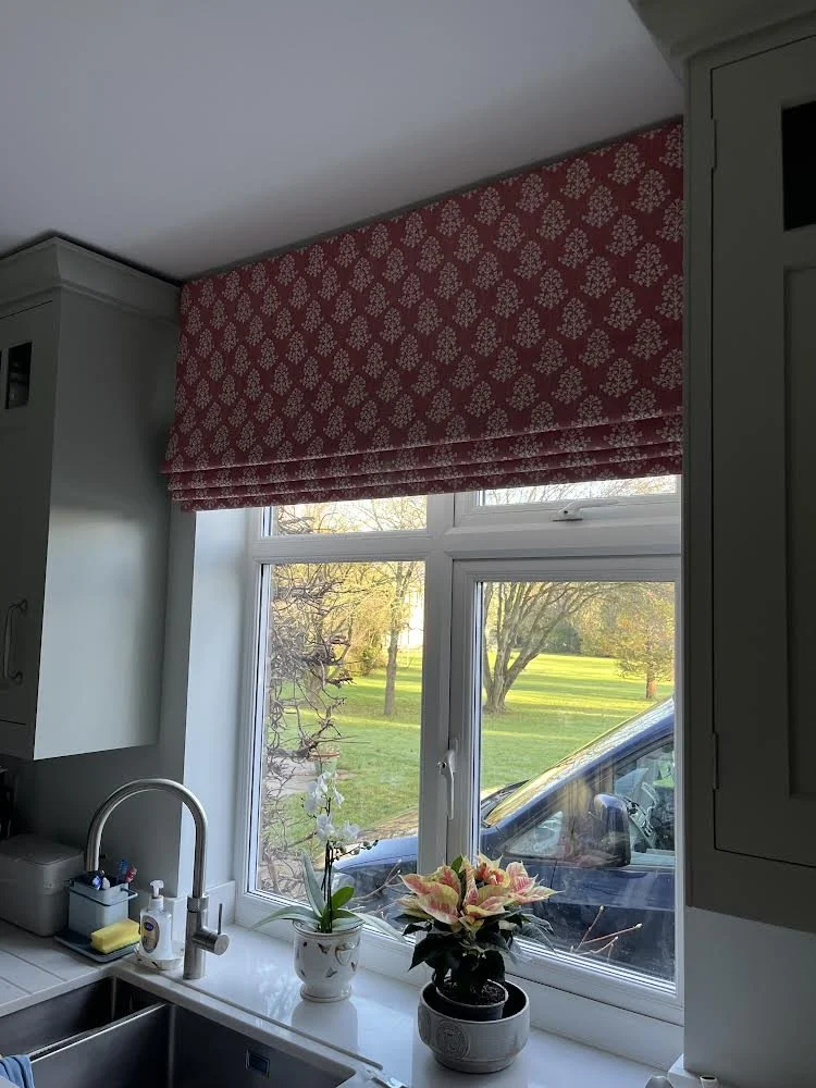pink pattern roman blind in kitchen