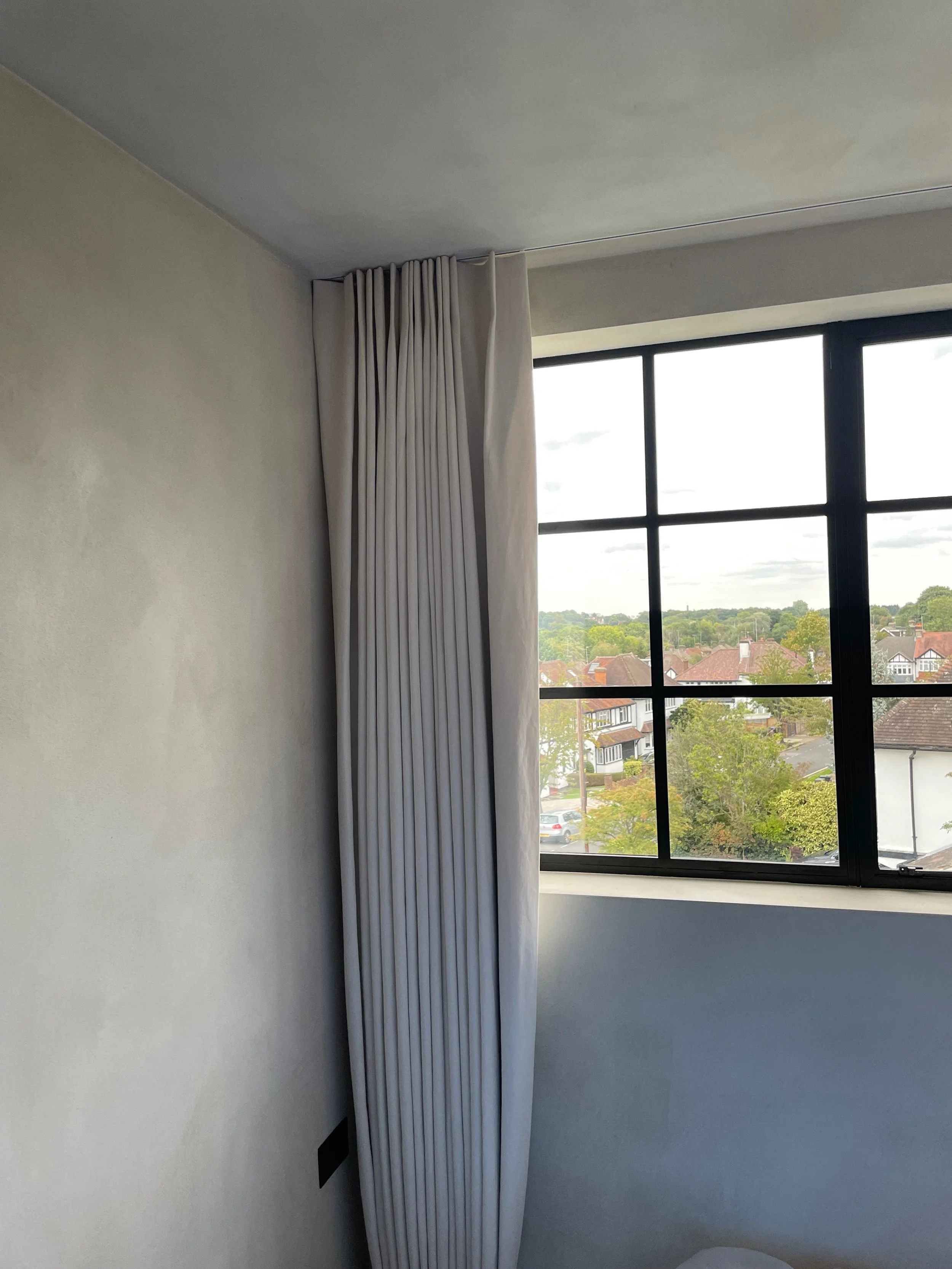 recessed curtain track with curtains