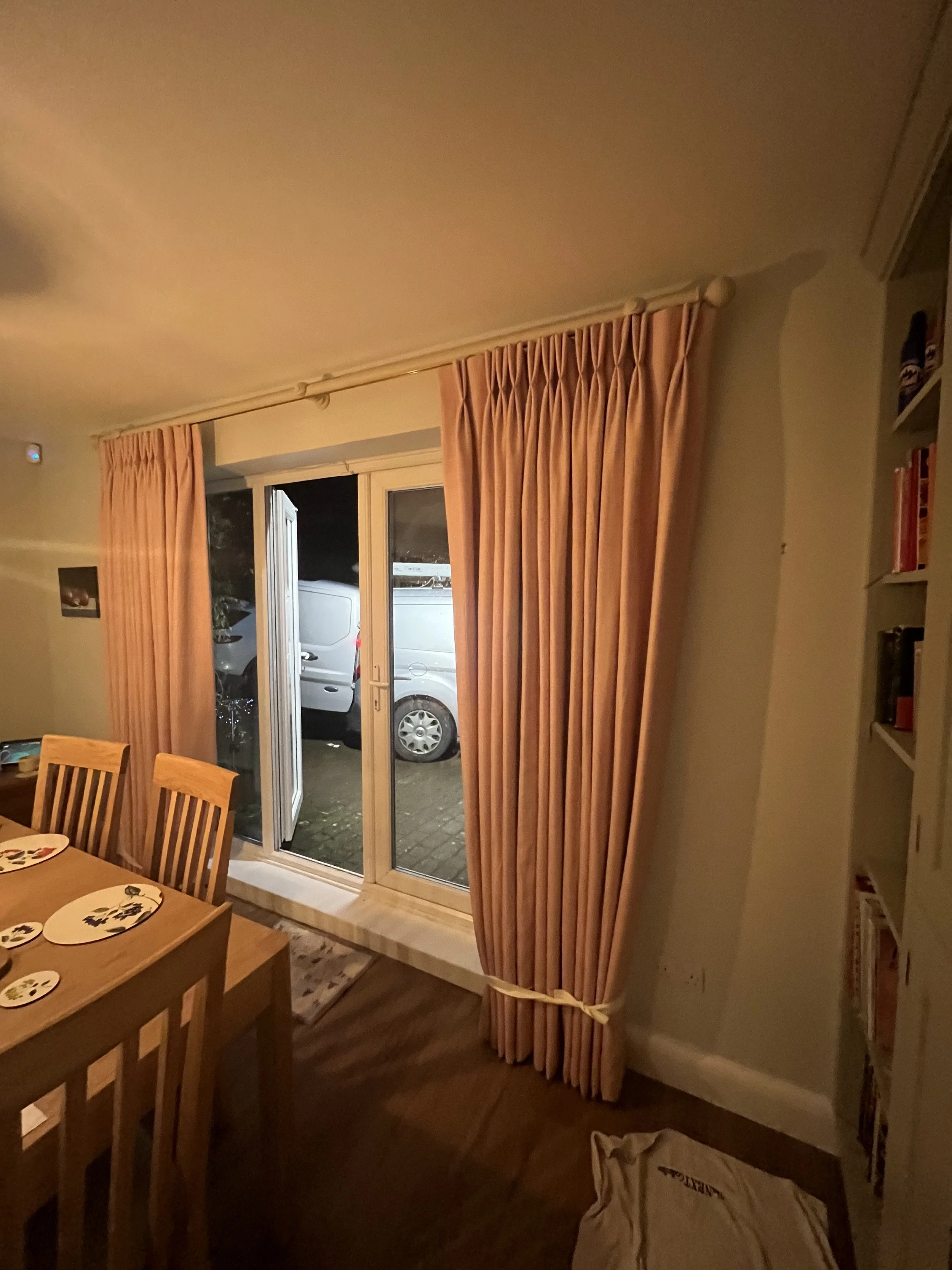 pink curtains in kitchen dining area