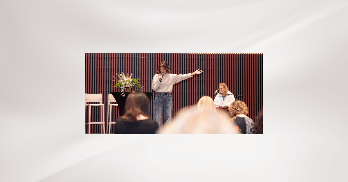 Holly Newton speaking at the She Lives Fearless Conference