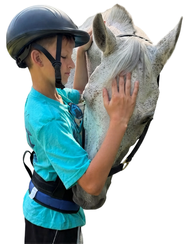Child with horse a horse during a Speech Stable NJ hippotherapy session