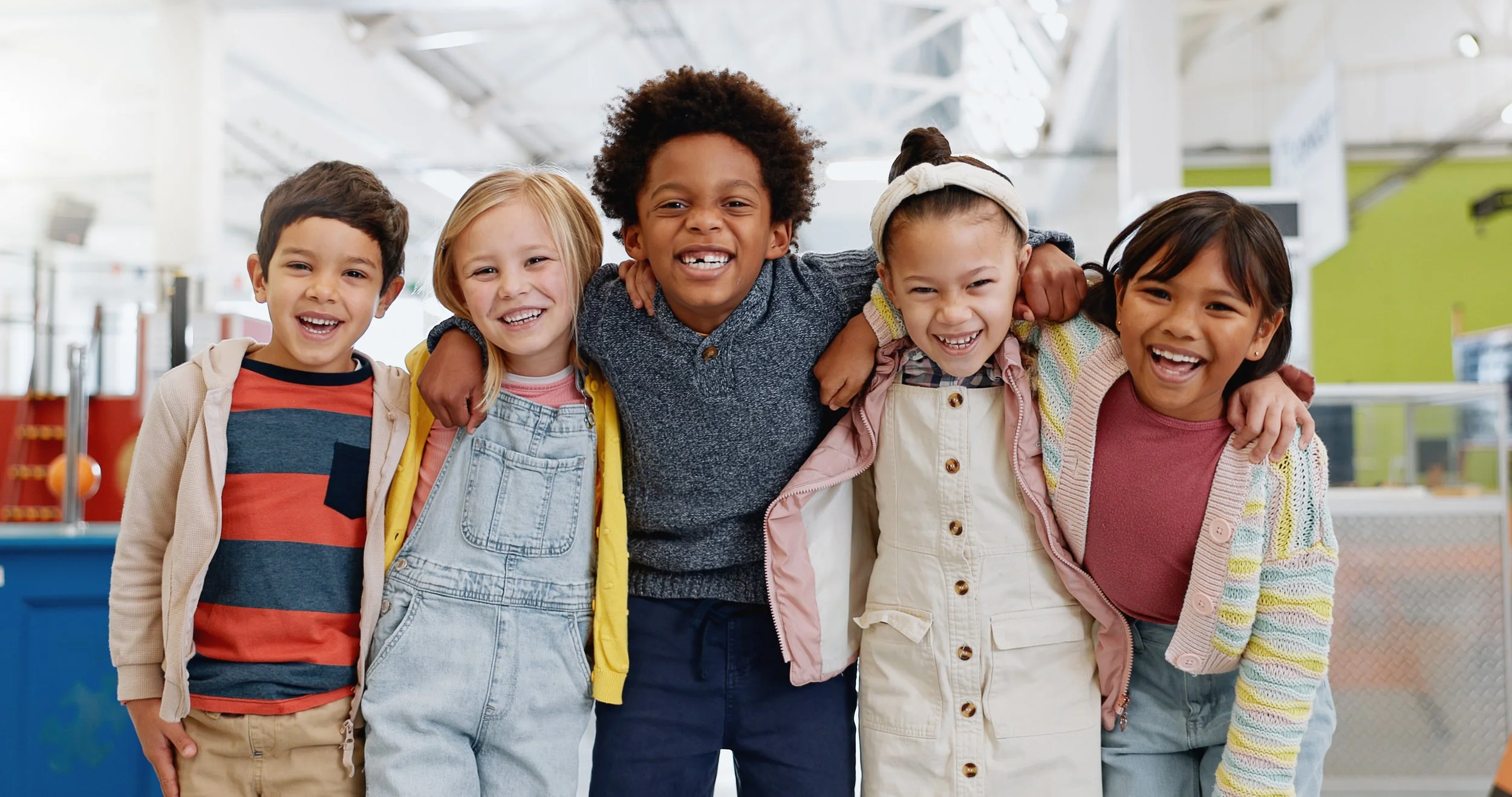 Group of smiling children representing pediatric speech, feeding, and myofunctional therapy.