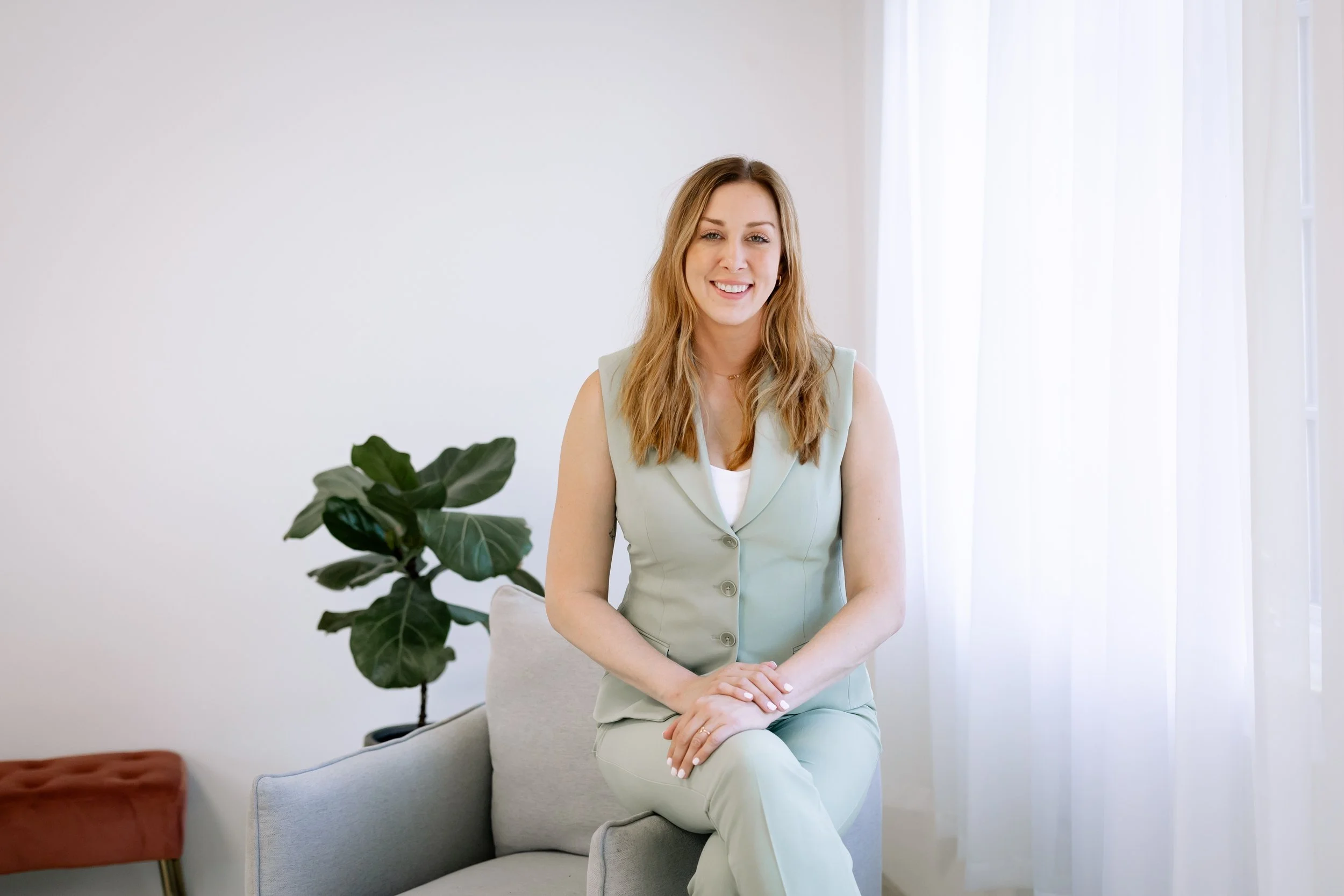 Dr. Jenn Moore welcoming new clients to Mouth Dynamics speech, feeding, and myofunctional therapy practice.