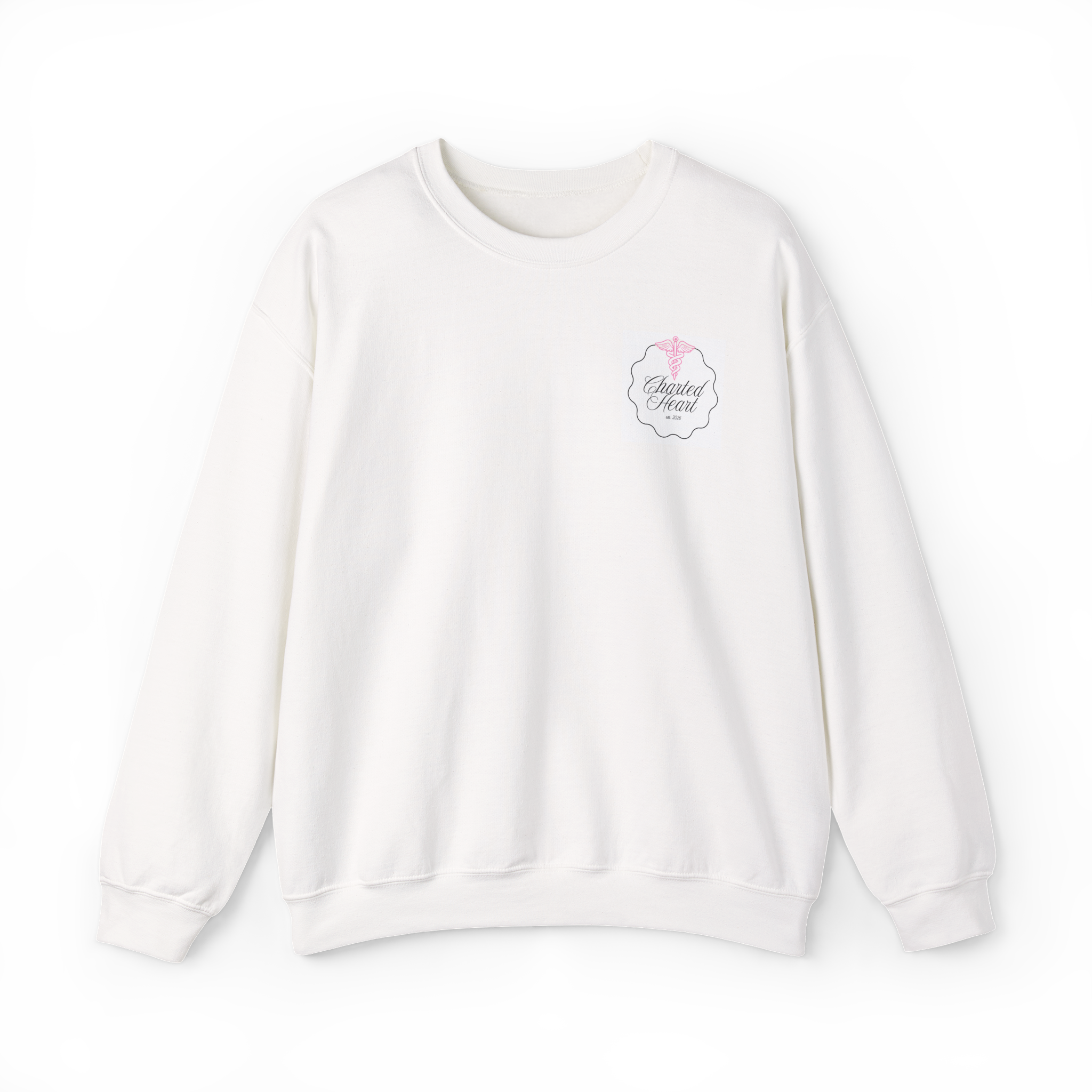 White sweatshirt with a pink medical caduceus and heart logo that says 'Charded Heart' on the chest, lying on a black background.