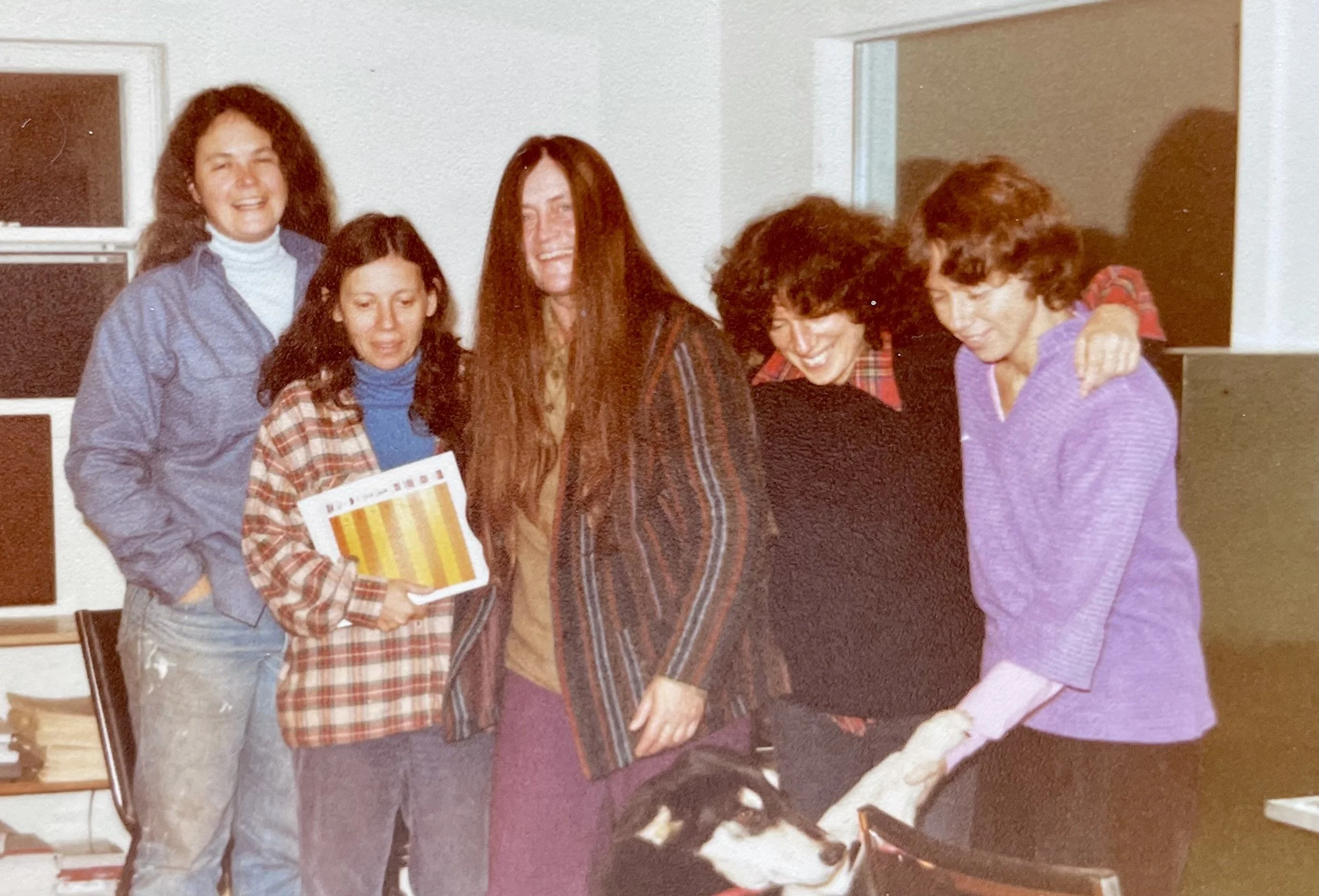 Judith, Irena Klepfisz (author, academic, and activist), Judy Waterman (artist), Bernie Mennis (writer and teacher), and her partner, Ann Blanchard. all are smiling