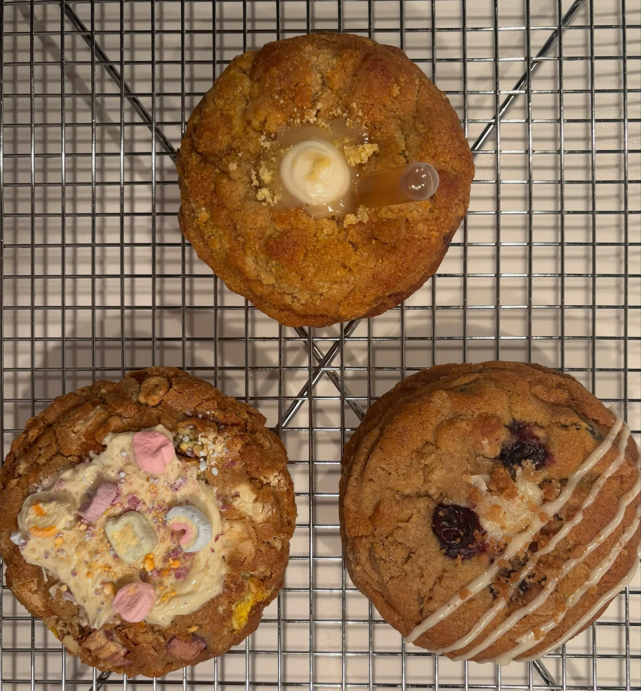 🥐 Weekly cookie menu is here!🥐

Everyone loved the White Macadamia Cookie, so we&rsquo;re making it a permanent menu item! That means just three cookie flavors this week instead of four. 🫶

🍀 Lucky Charm: Brown butter cookie dough loaded with whi