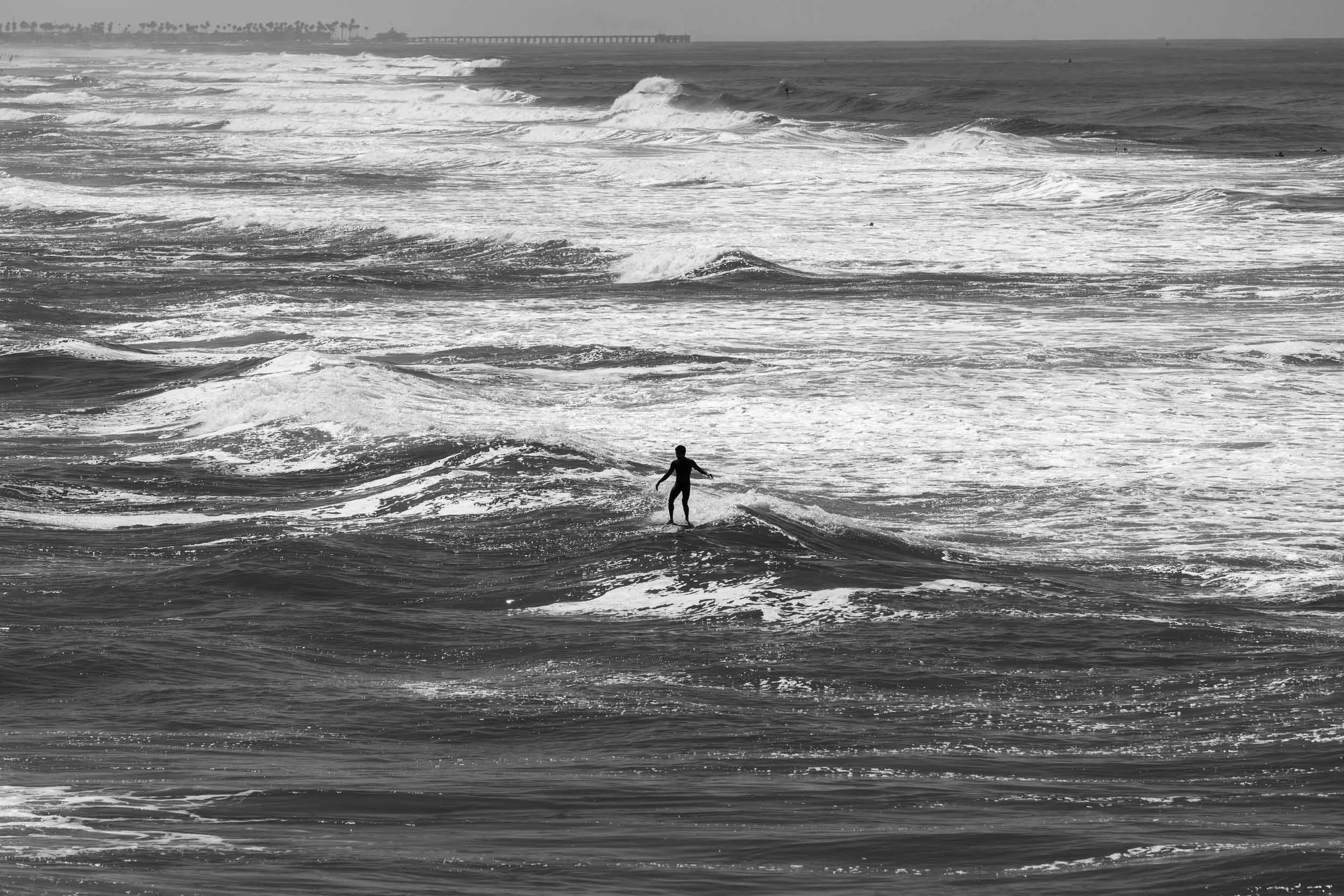 Surfer silhouette at Huntington Beach