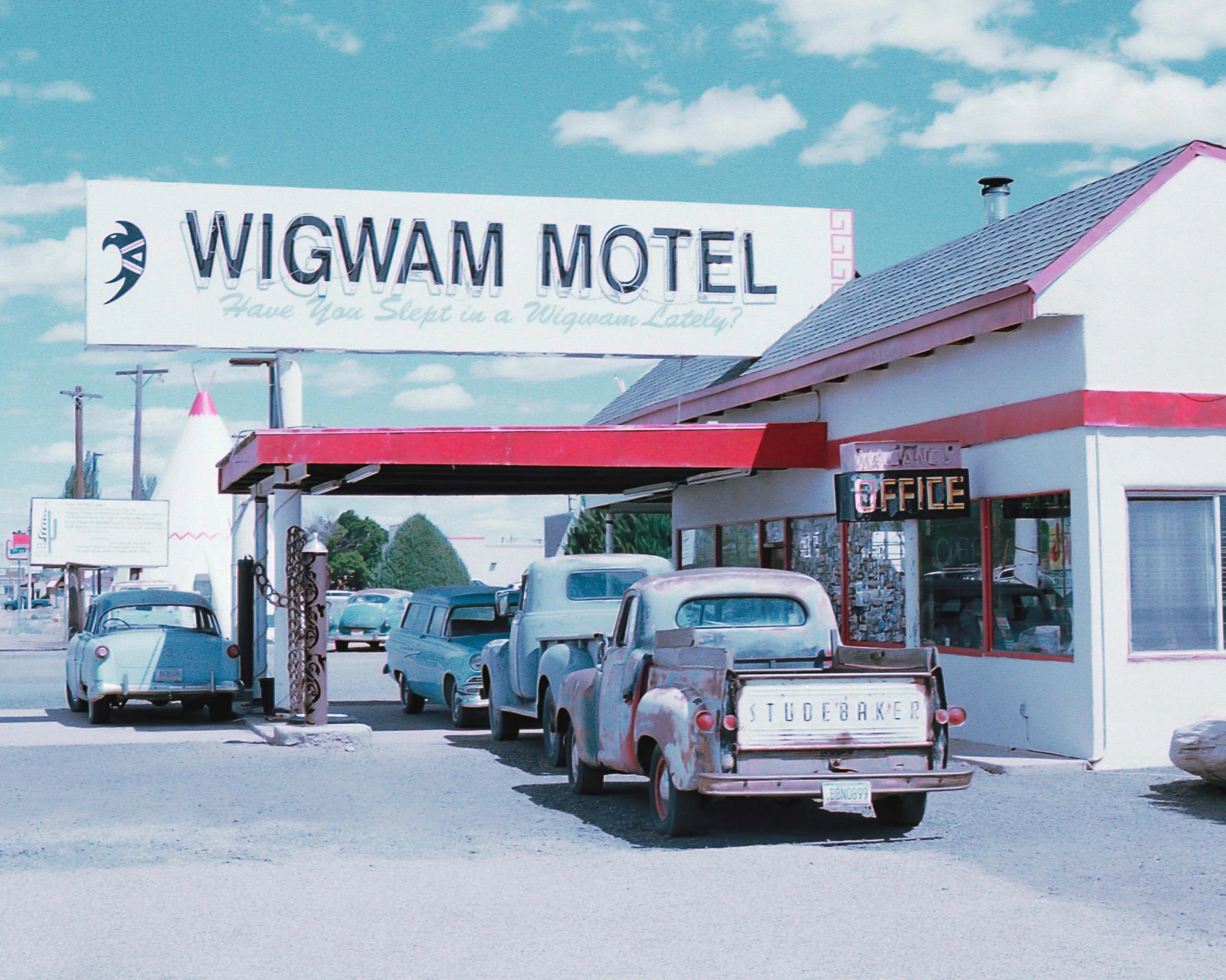 A parking lot filled with classic cars