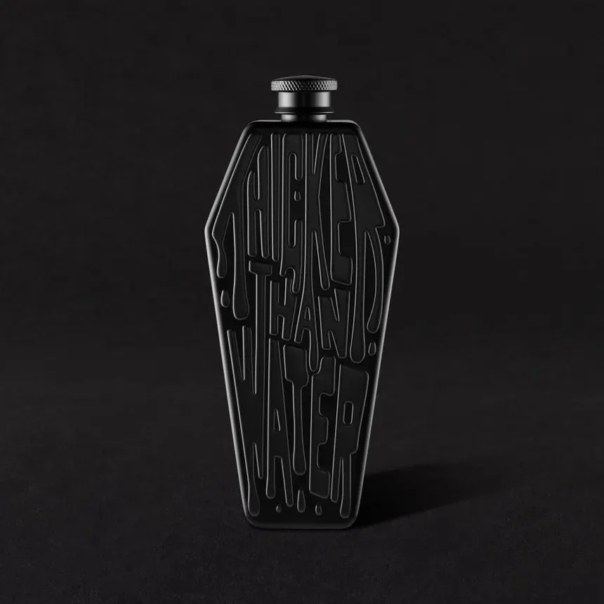 Black bottle with embossed text reading "He Said Thank You Later" on a dark background.