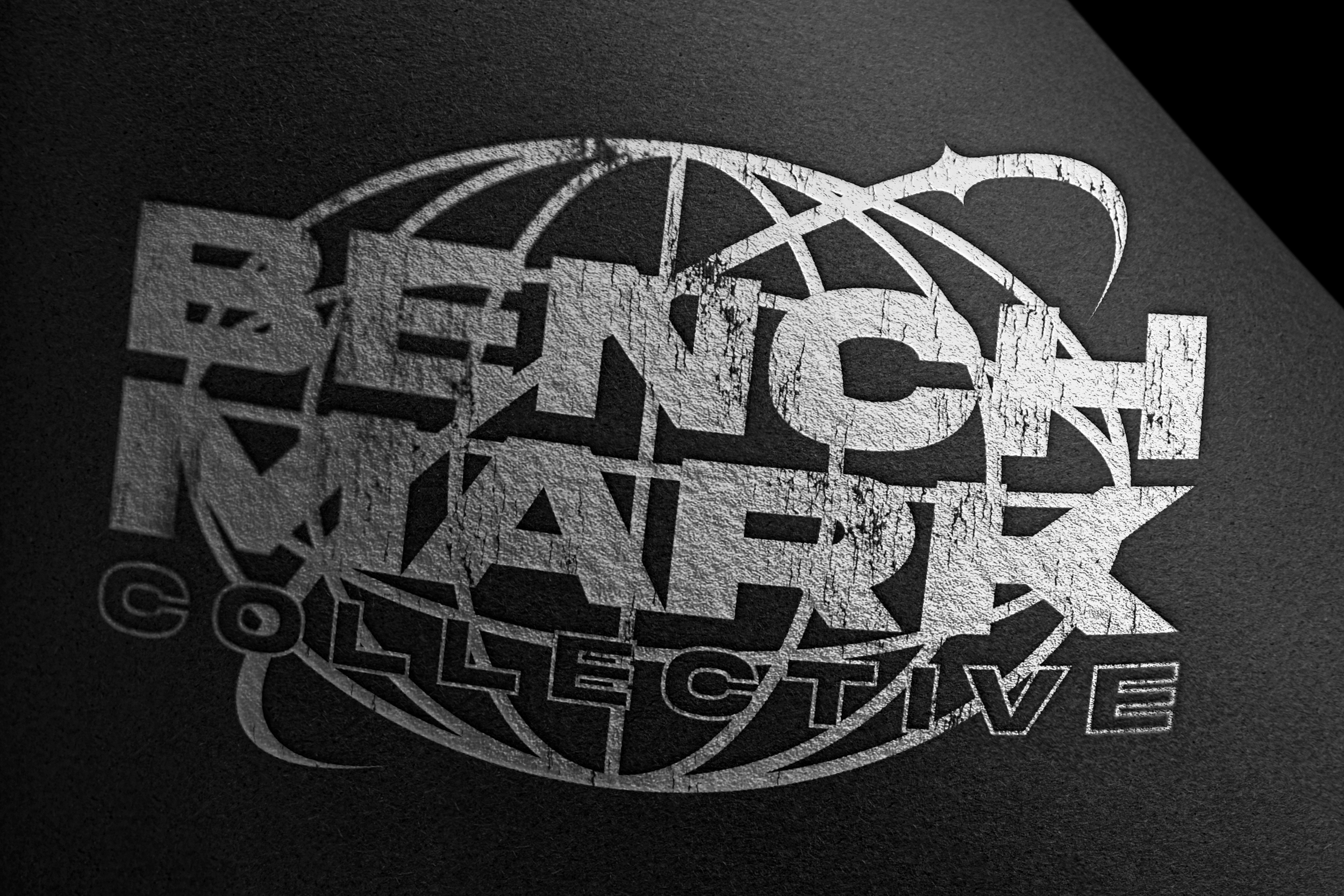 A black and white logo with a skull design and the text 'Gothic' or 'Gotham' and other words partially visible, with a textured, cracked appearance.