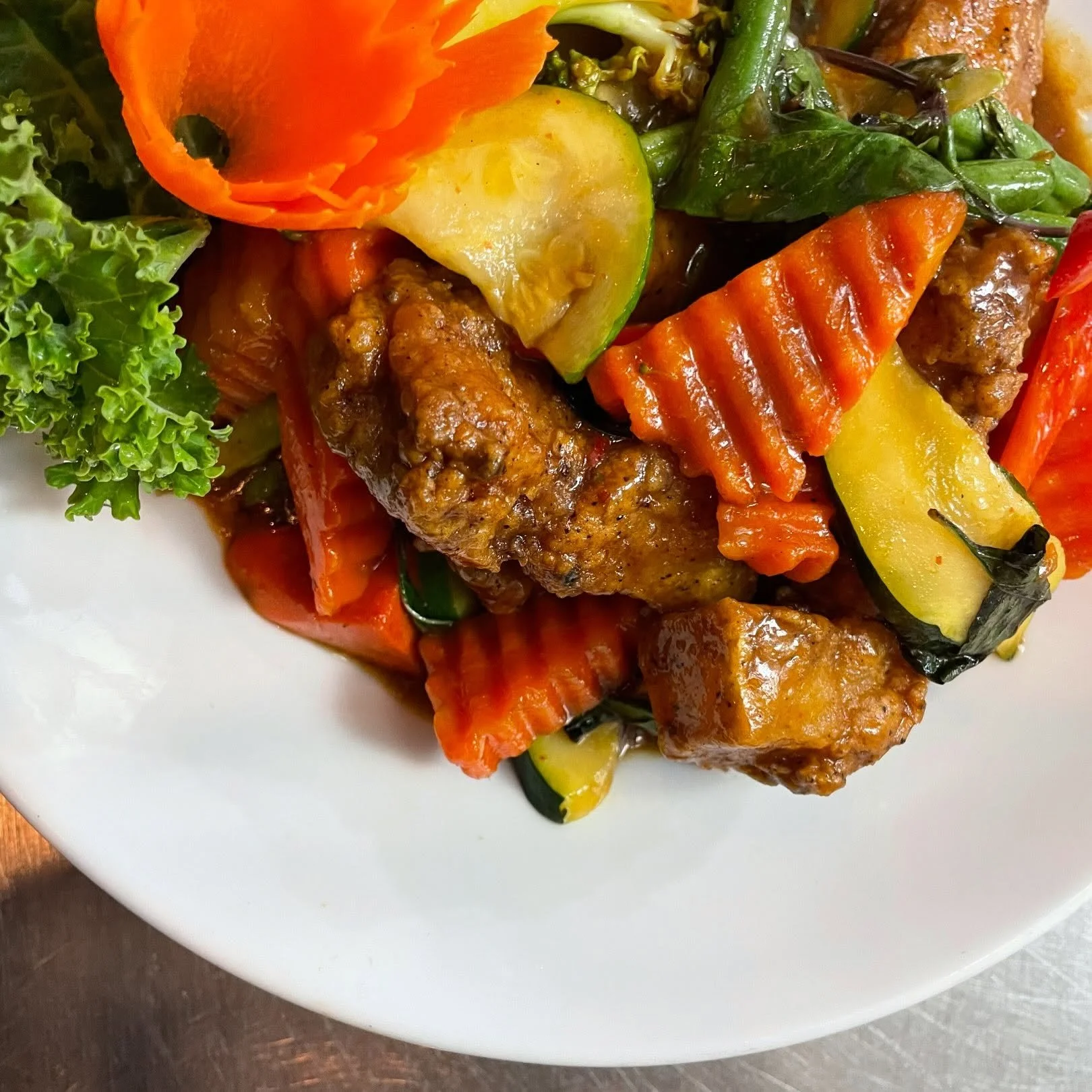 Crispy Pork Belly in our House-made Spicy Basil Sauce. Complimented with an assortment of saut&eacute;ed vegetables. The flavors and textures are intense, find out for yourself! 

#thaifood #thai #tacoma #tacomafood #tacomafoodie