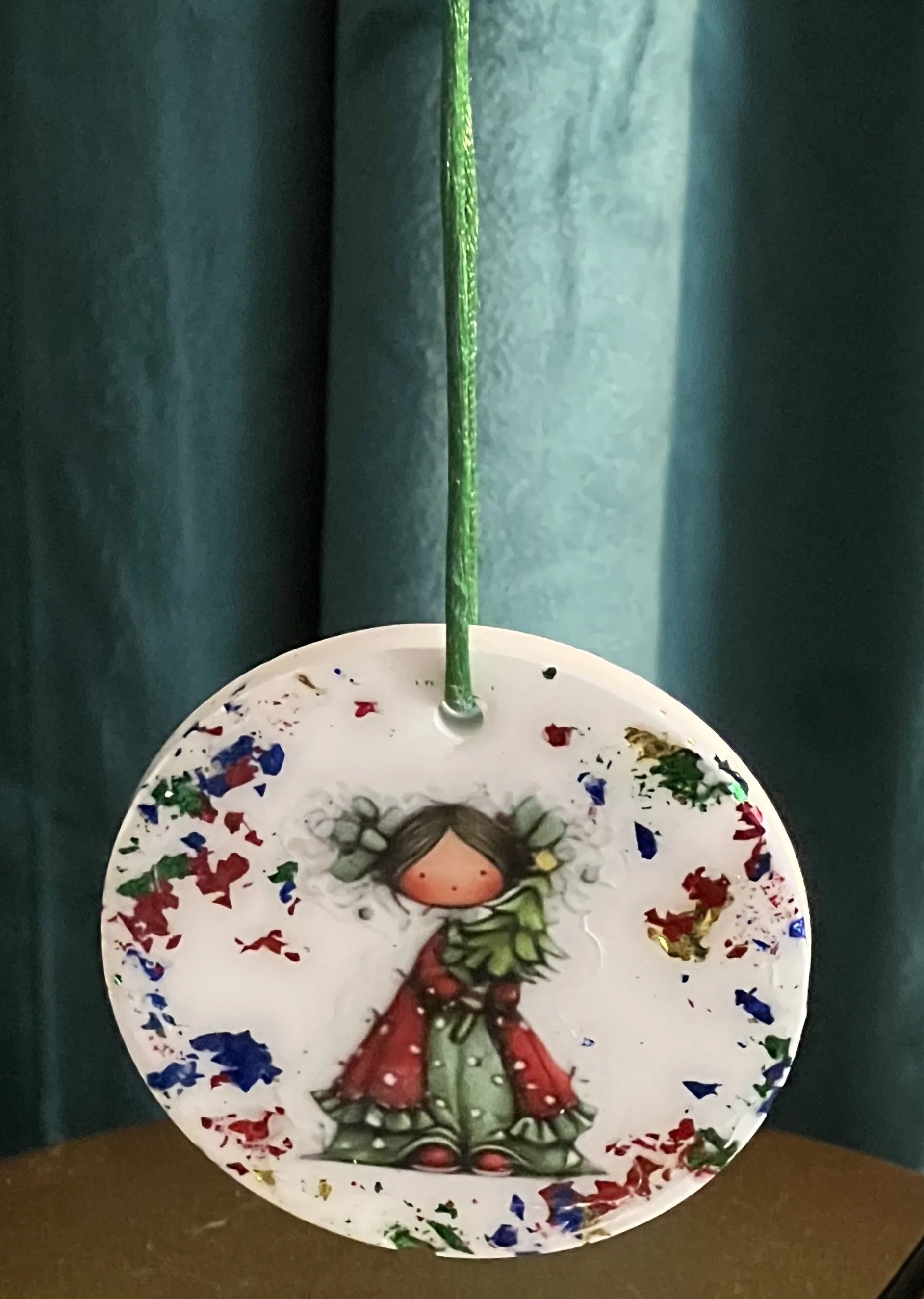 Whimsical Holiday Fairy Holding A Tree Ornament