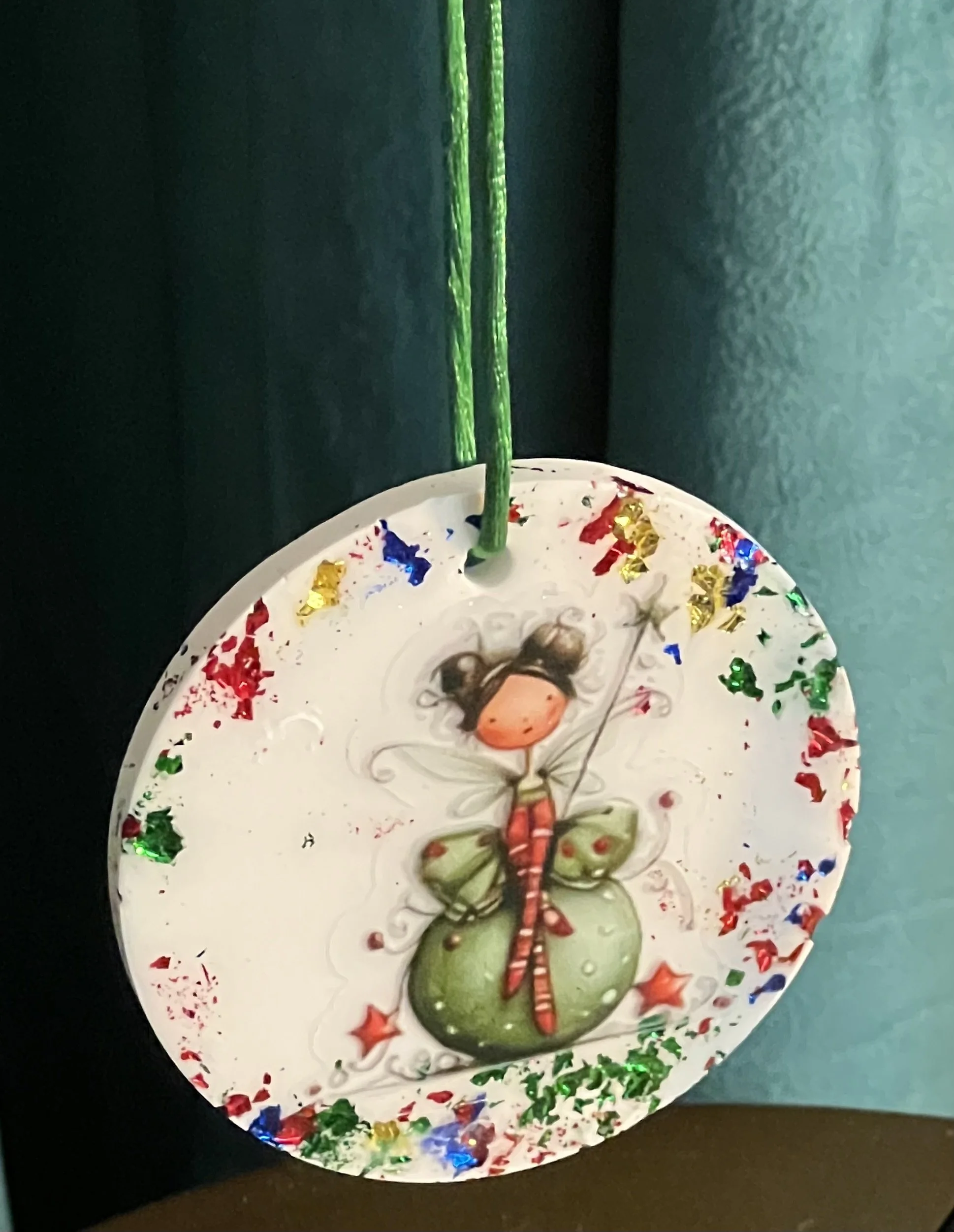 Enchanting Fairy Sitting On An Ornament