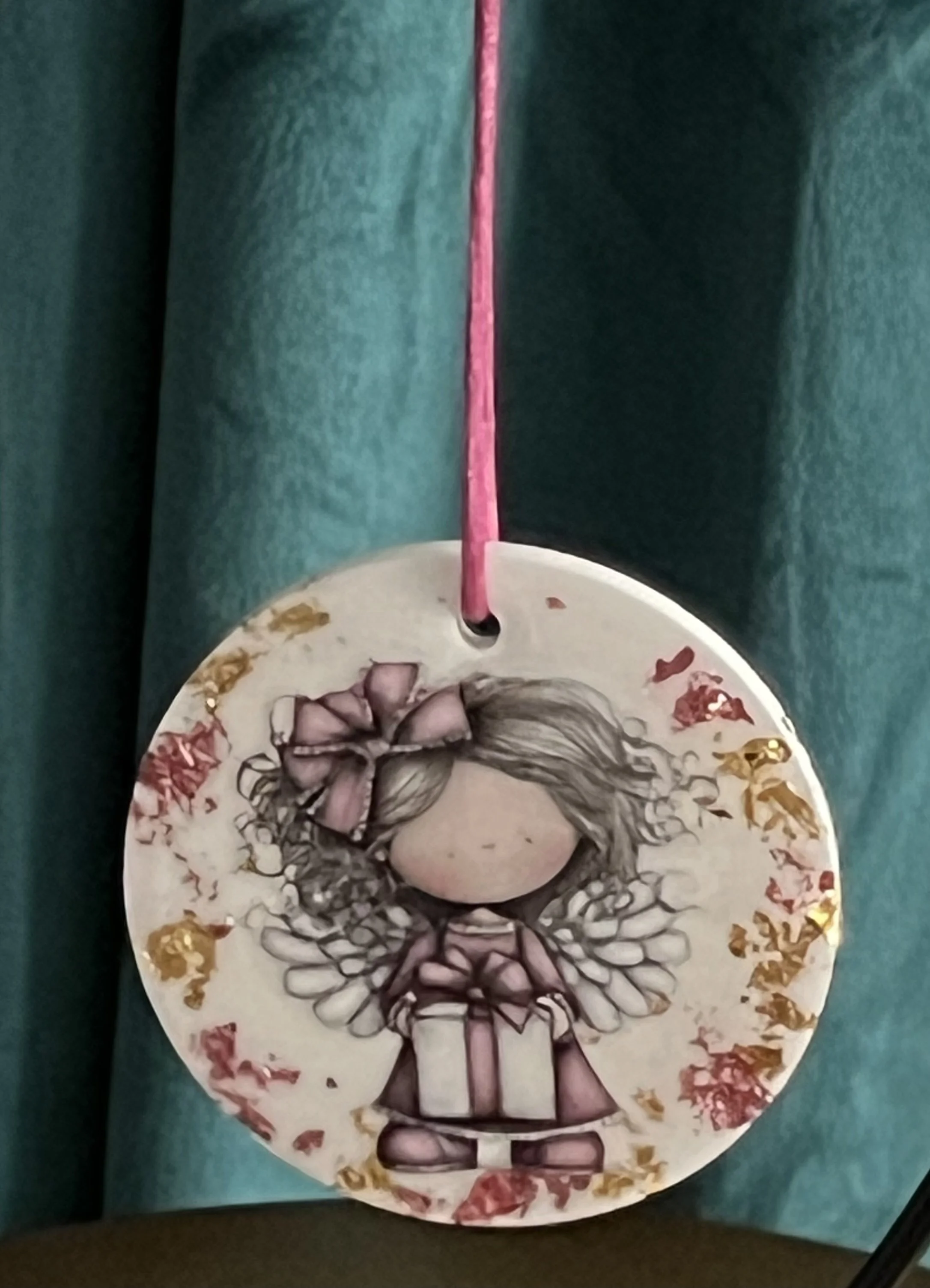 Whimsical Angel Holding A Gift Ornament