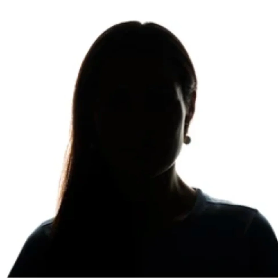 Silhouette of a woman against a white background