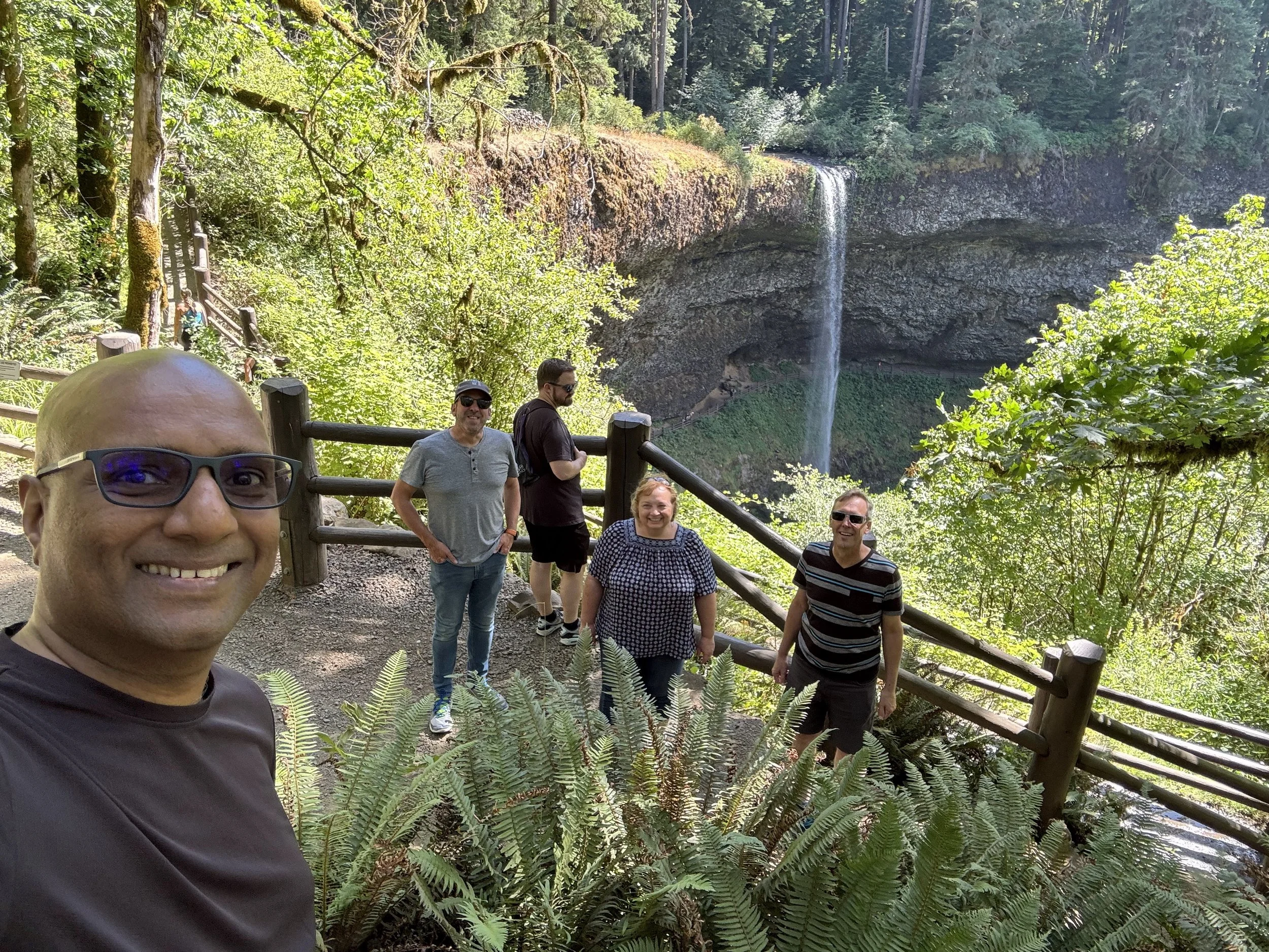 Melissa Crabtree hikes with friends and colleagues at Silver Falls State Park on her most recent visit to Oregon.