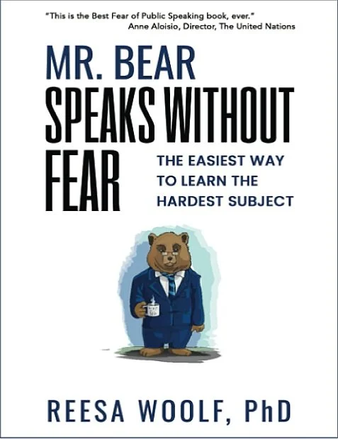 Cover of a book titled 'Mr. Bear Speaks Without Fear' by Reesa Woolf, PhD, featuring an illustration of a bear dressed in a suit holding a cup of coffee.