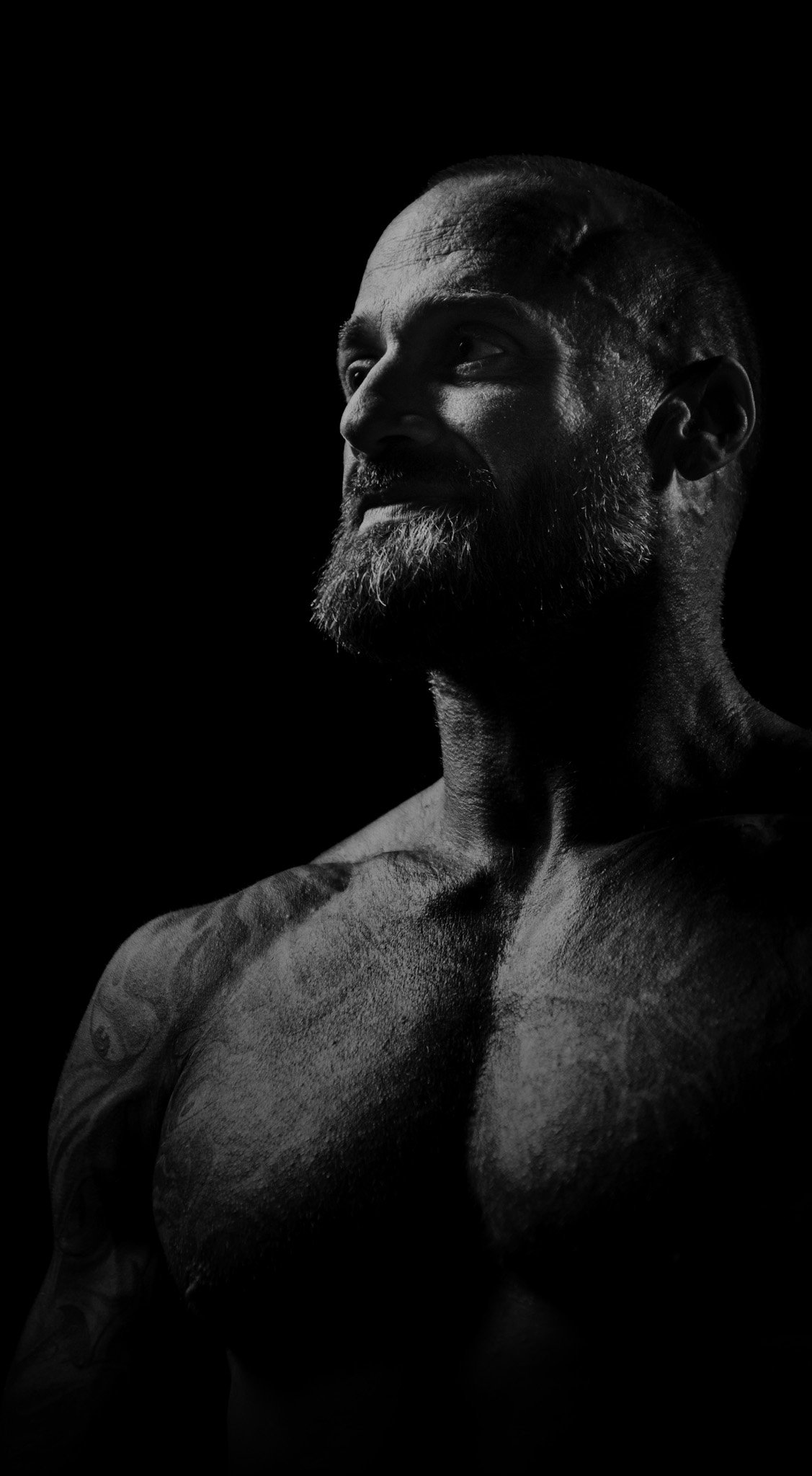 Black and white portrait of Brett Pershall, founder of NAV Crew.