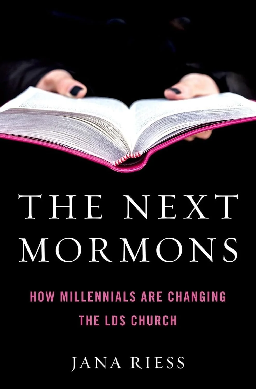 Book cover titled 'The Next Mormons: How Millennials Are Changing the LDS Church' by Jana Riess, featuring an open book with a pink cover, against a dark background.