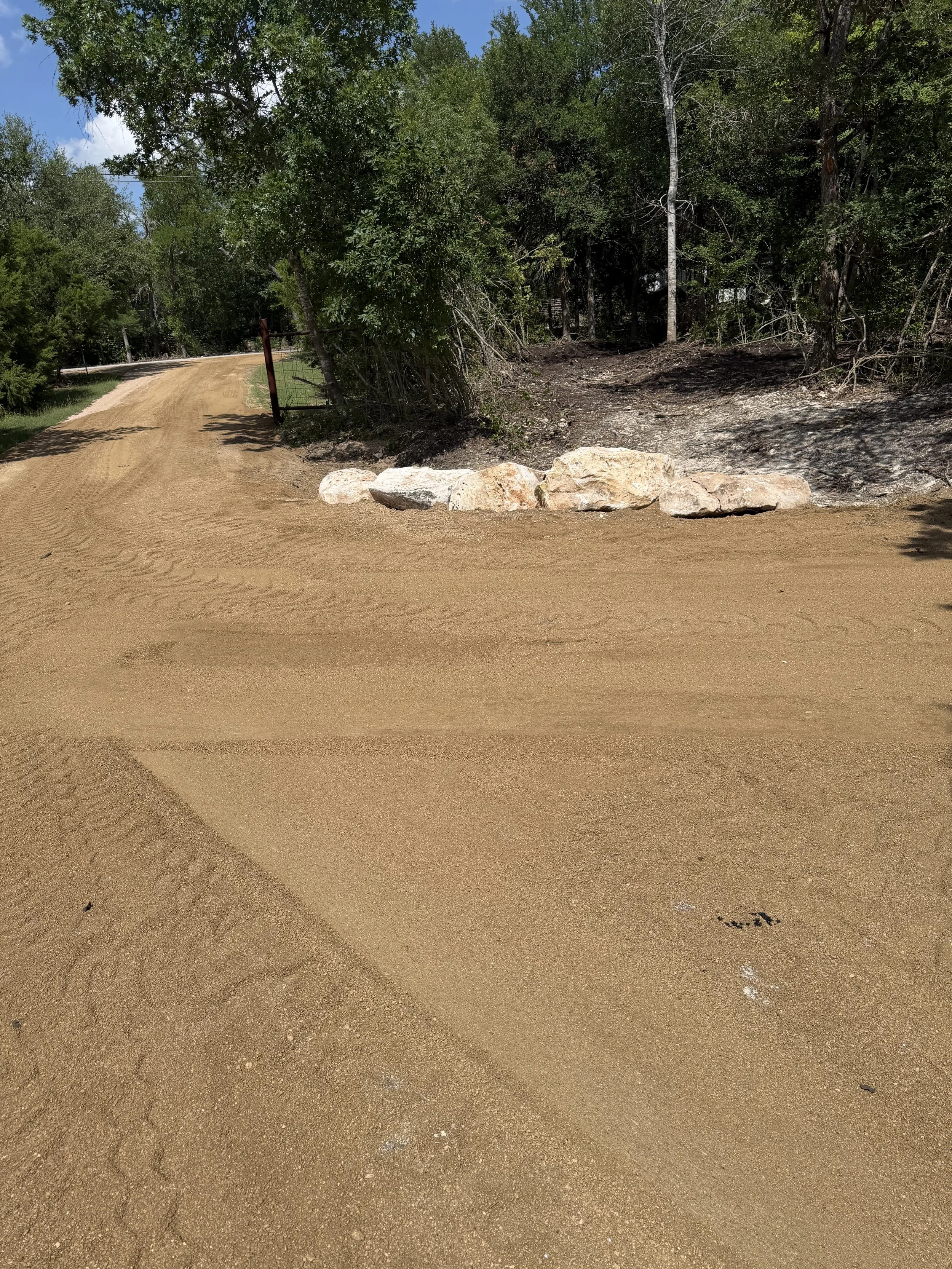 Completed ranch road grading and land clearing project in Georgetown, Texas by JR
Excavating.