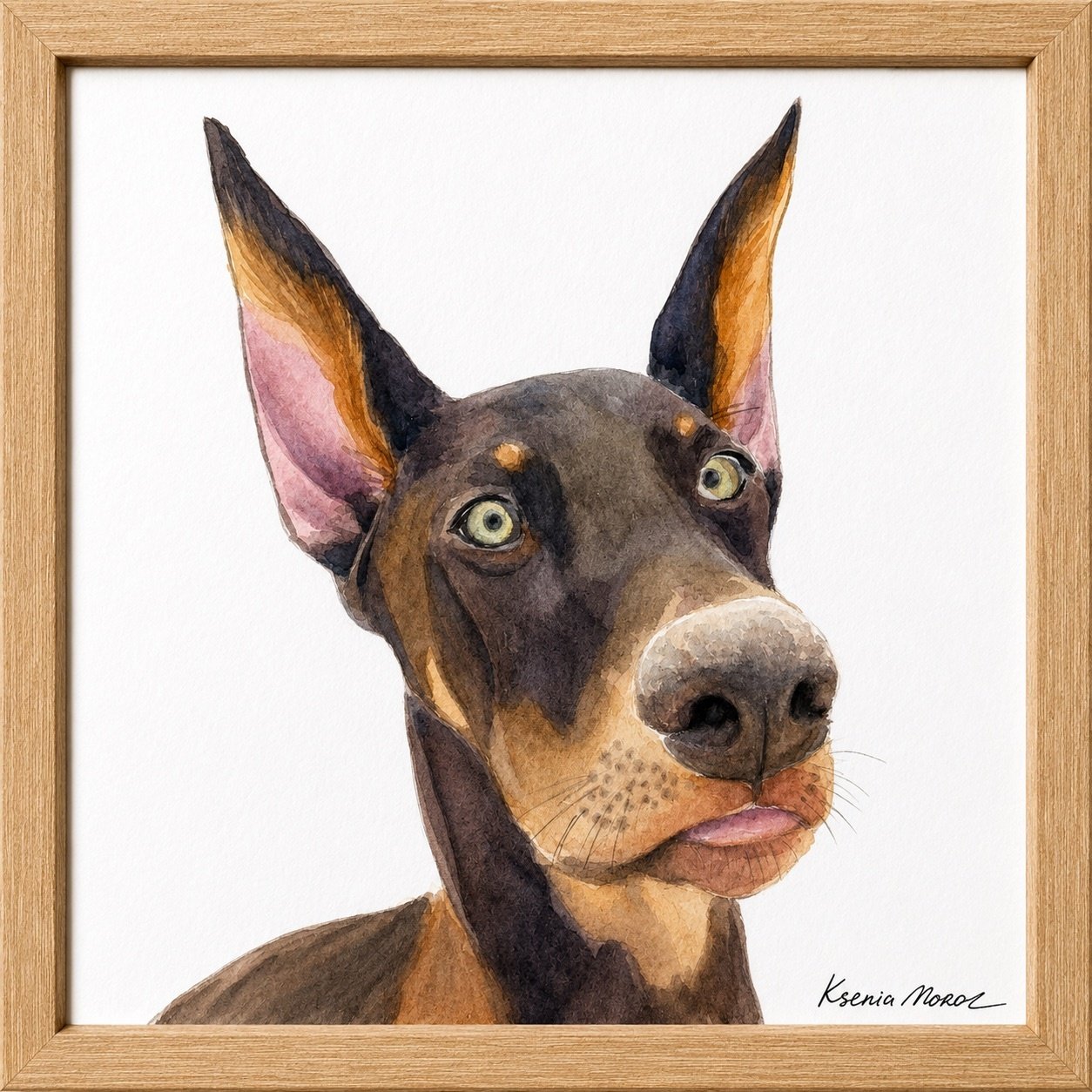 Watercolor painting of a dog with large ears, mostly black and brown fur, with a white background, framed in wood.