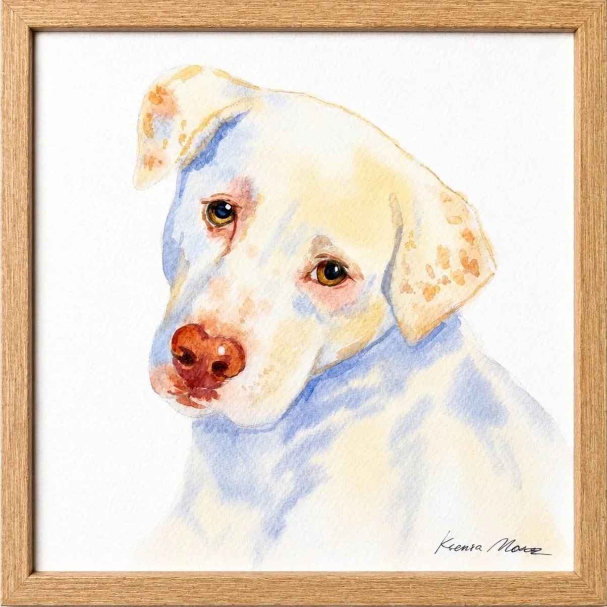 Watercolor painting of a light-colored dog with brown eyes and pink nose, framed in wood.