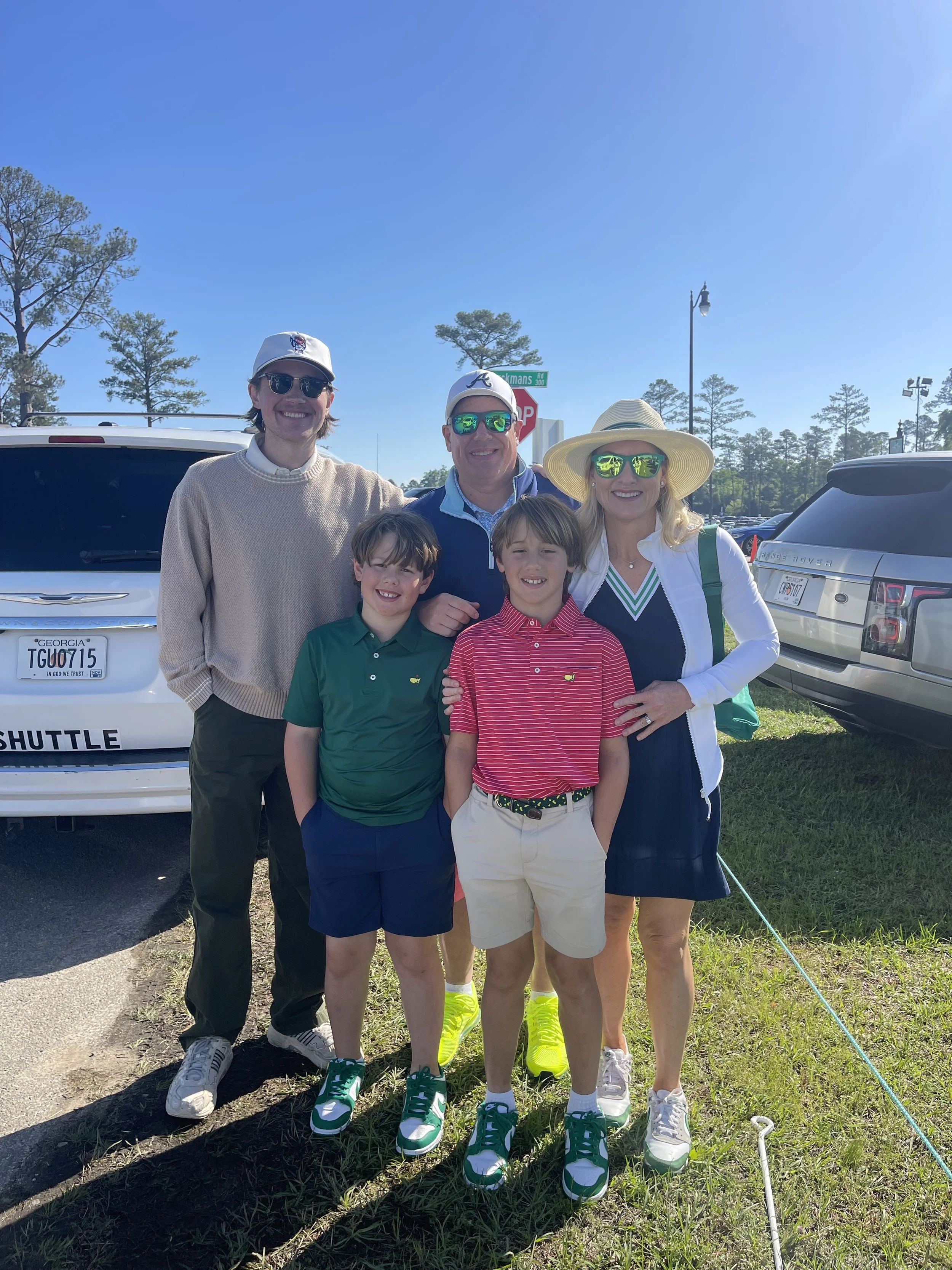 Golfers at a PGA golf event with private shuttle transportation available for groups and spectators