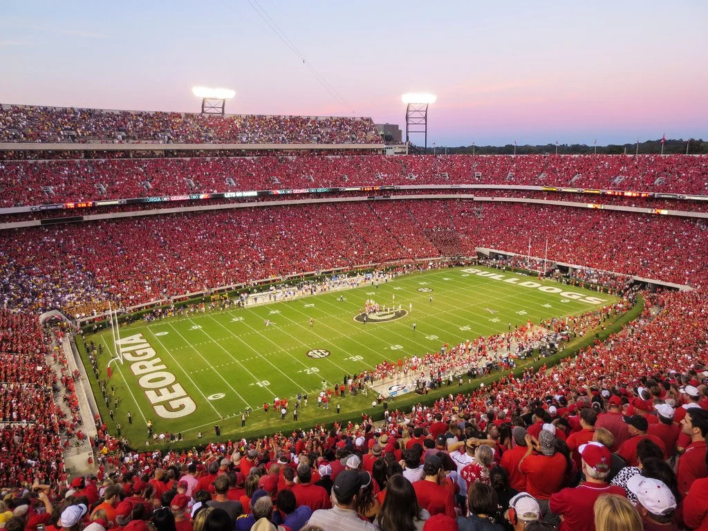 Private college football shuttle transportation for Georgia Bulldogs, Georgia Tech, Kennesaw State and other game day events in Georgia.