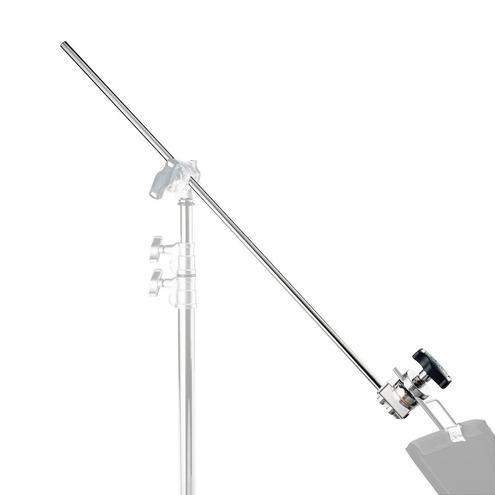A film or photography lighting c-stand with a boom arm and a clamp, used in studio settings.