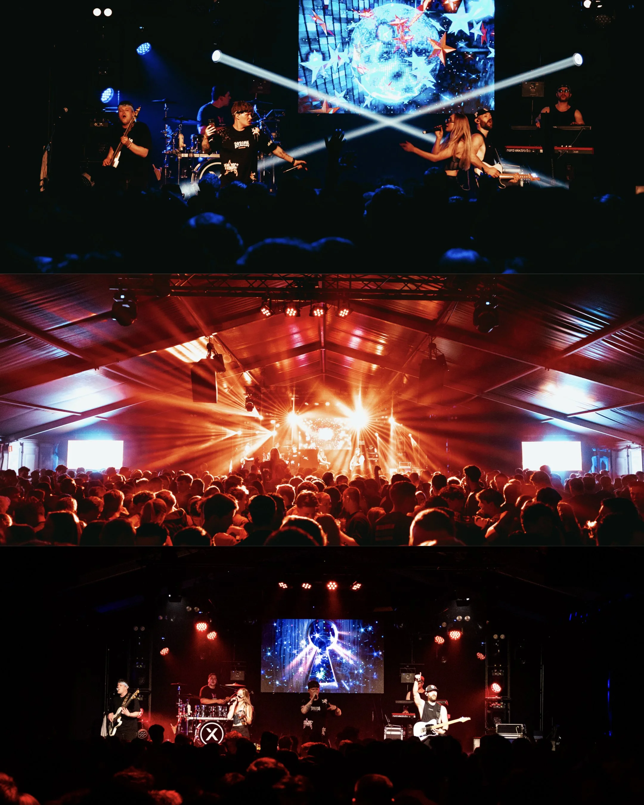 A live concert on stage with band members performing, colorful stage lighting, and a large screen displaying graphics of stars, planets, and cosmic themes. The audience is visible in the foreground, enjoying the show.