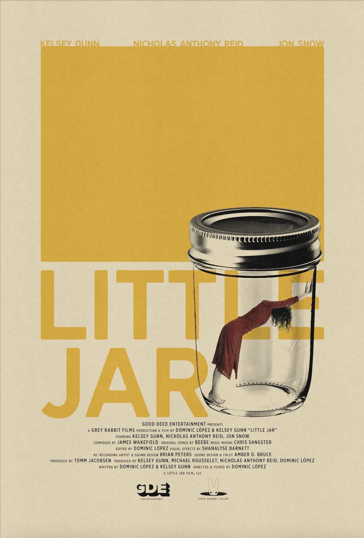 Movie poster for 'Little Jar' showing a large jar with a woman in a red dress bending down inside it, with her head and arms leaning out. The top of the poster has a yellow rectangle with actor names, and the title 'LITTLE JAR' in large yellow letters. There is additional text at the bottom with production and cast details.