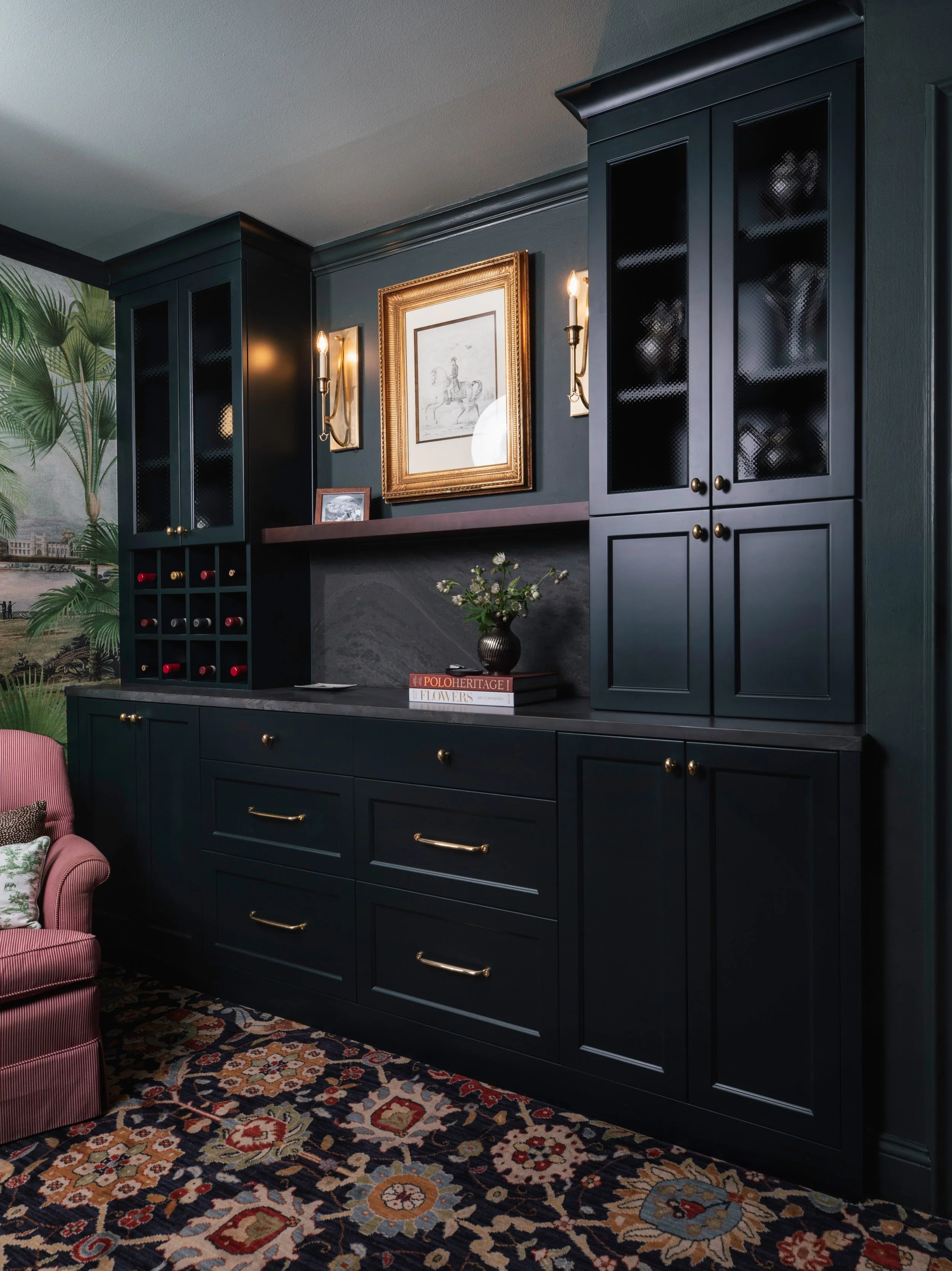 Some spaces aren&rsquo;t meant to be bright, they&rsquo;re meant to feel collected, layered, and lived in.

For this project, we leaned into rich, saturated cabinetry, dramatic stone, warm brass accents, and classic detailing to create a space that f
