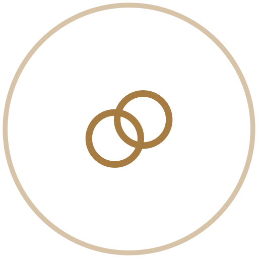 Two intertwined gold rings inside a circle on a black background.