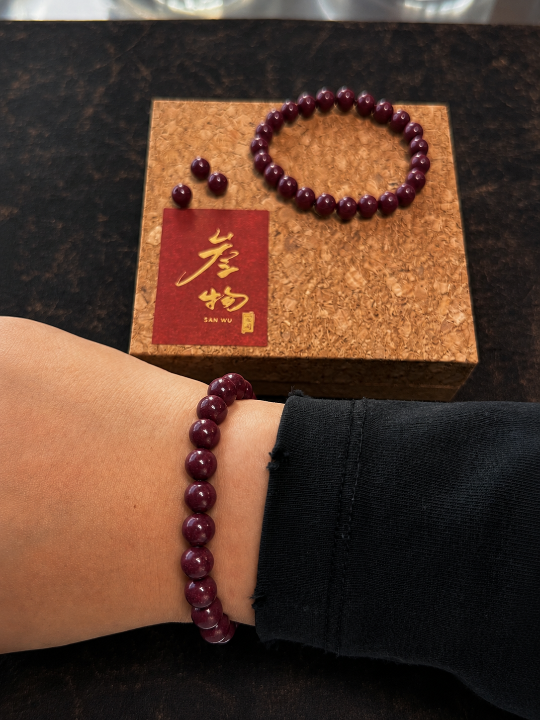 Chinese herb bead red worn.png