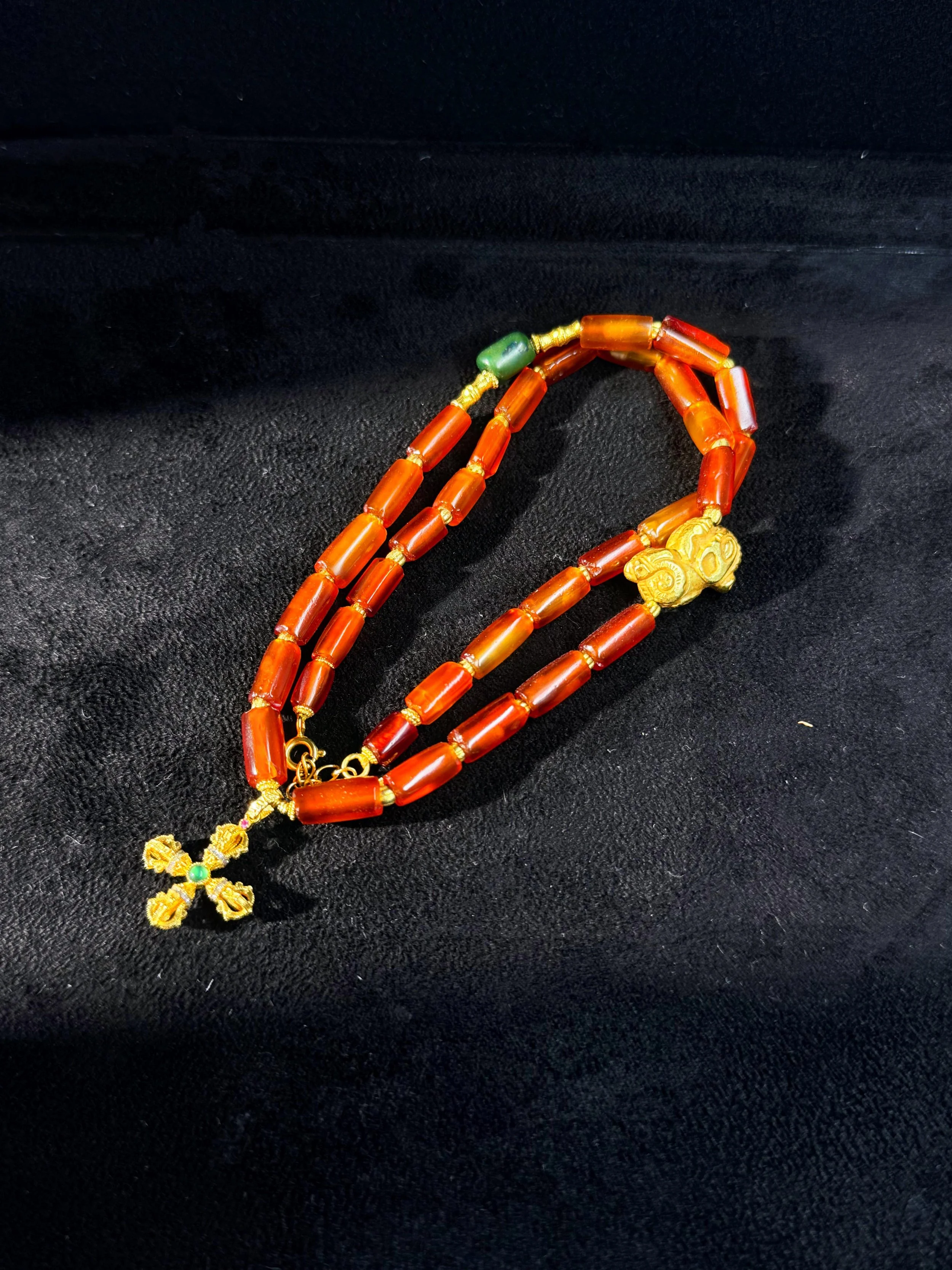necklace w gold Persimmon Calyx Motif bundled.jpg