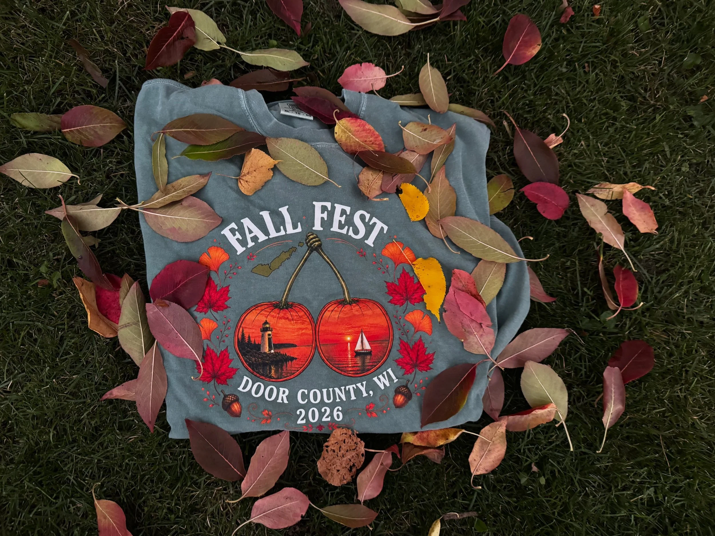 Sister Bay Fall Fest is approaching! If you&rsquo;re looking for something to wear, I made a unique cherry turned into pumpkins with a photo of the sunset I took in Gills Rock this summer. Limited stock. Available at the Pioneer Store in Ellison Bay!