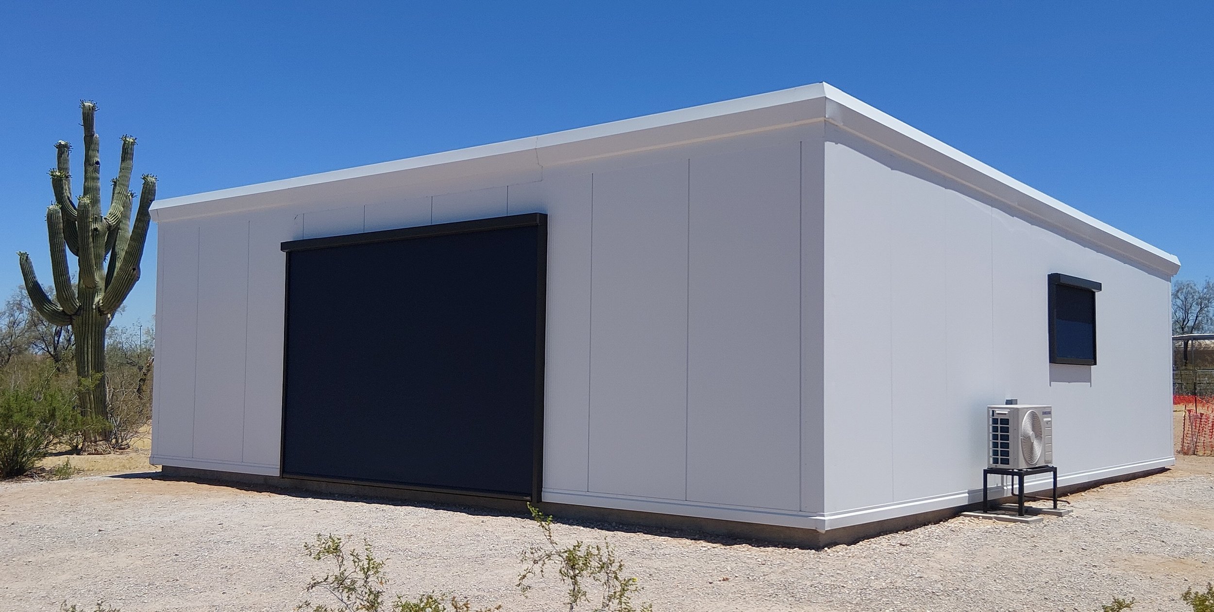 Ultra modern and simple house in the desert. Low foot print, low energy use. Prepped for water harvesting.
