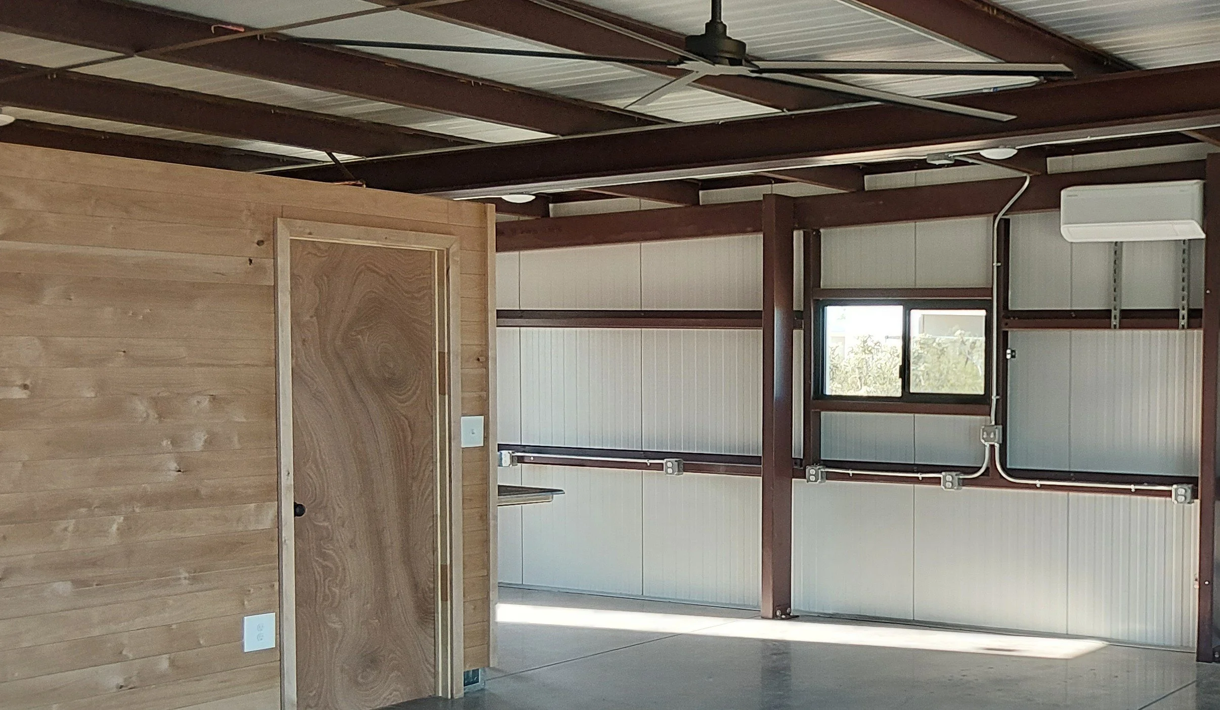 Inside this one of a kind open floor home. The owners so loved the industrial steel look, they left everything exposed.