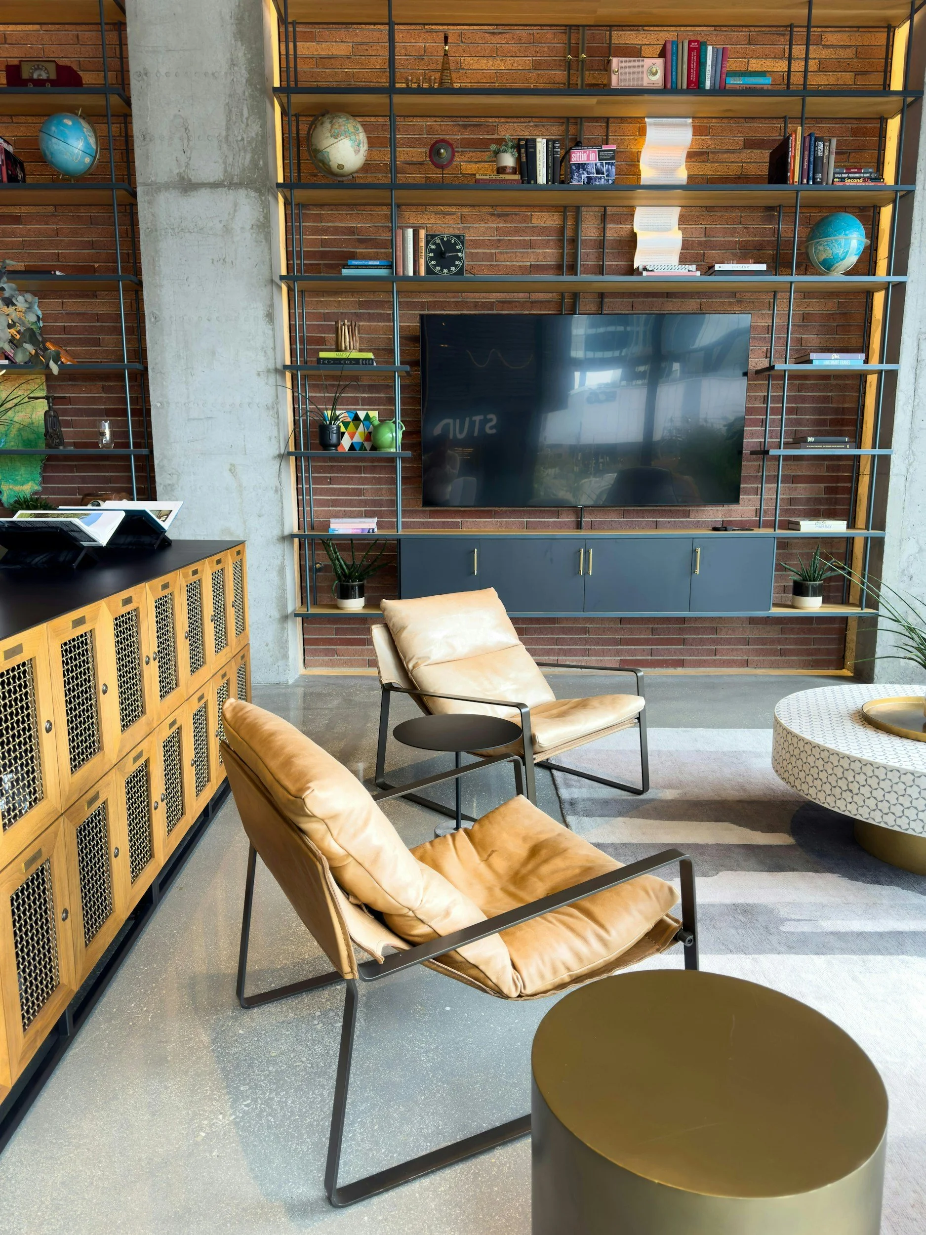 A pristine luxury living space featuring bespoke architectural metals and brickwork, cared for with the scientific precision of MORAACHI & Co.'s domestic stewardship.