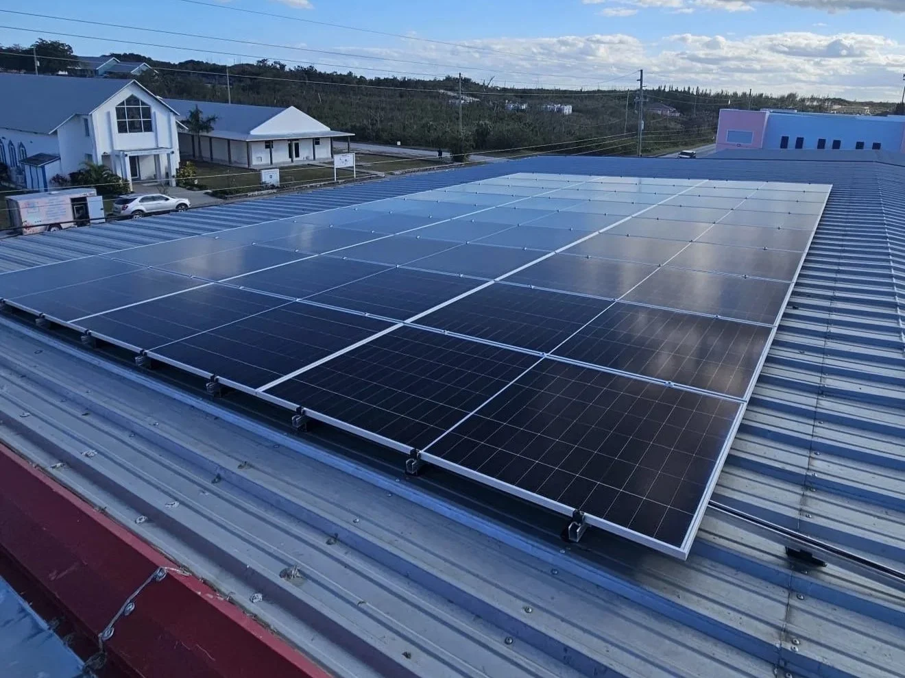 Solar panels installed on a metal roof.