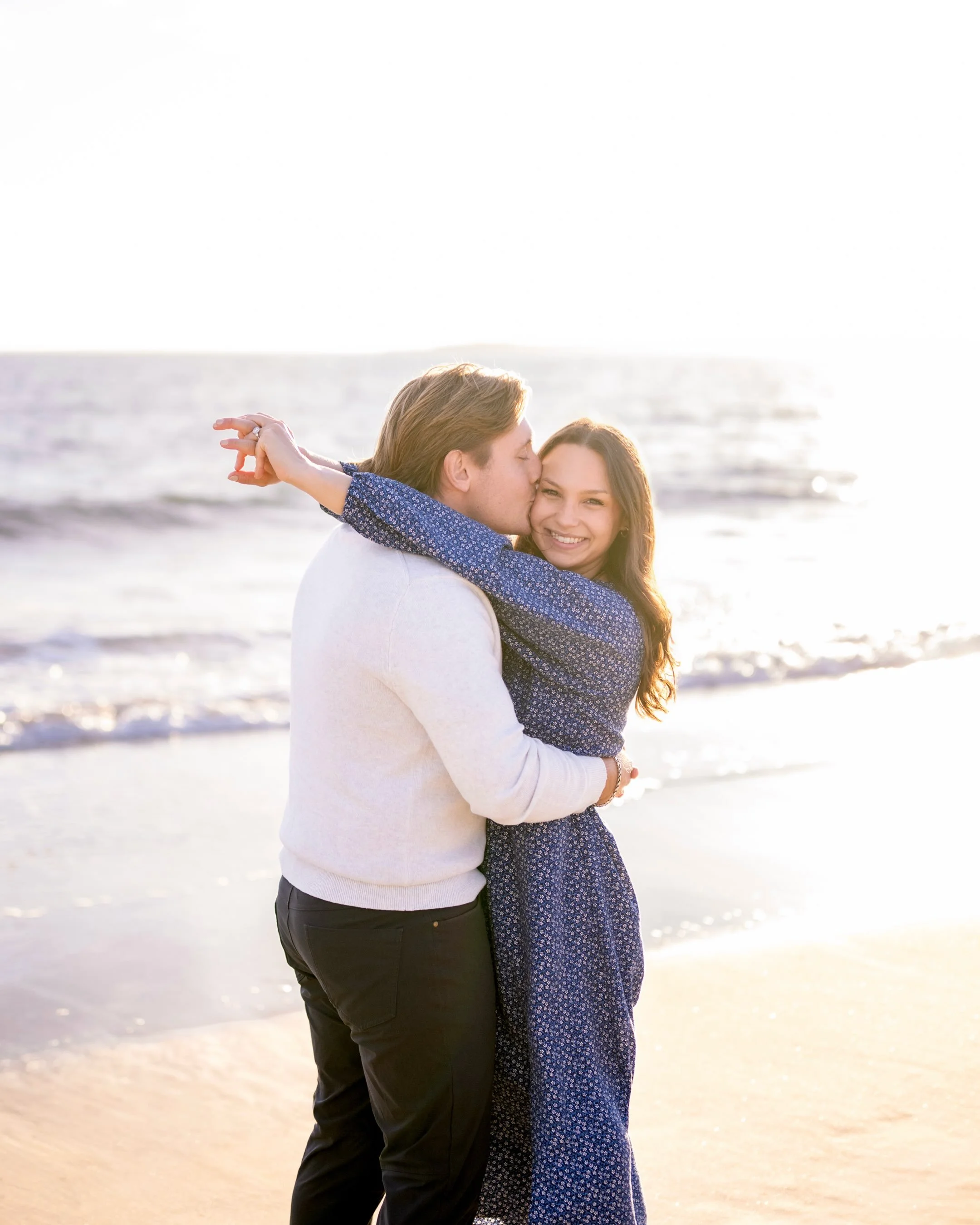 Give me a golden sunset, a beeeeautiful couple inside and out, and a beach to run wild and free, and you&rsquo;ve got yourself a pretty perfect evening. ✨

Rhode Island engagement session with the sweetest newlyweds to-be! 🥂💍💖