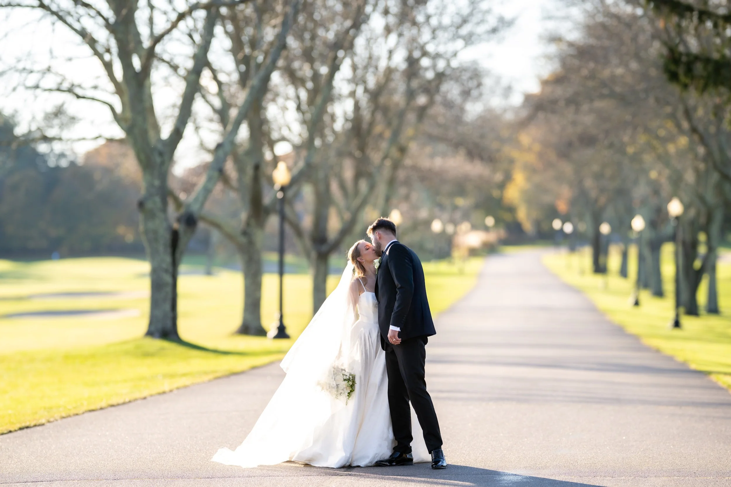 Oceanfront wedding ceremony setup in Narragansett, RI, photographed by Allison Mott.