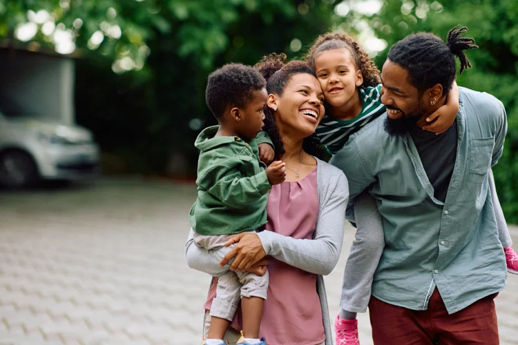 A family enjoying time together while JoyRide handles their vehicle maintenance